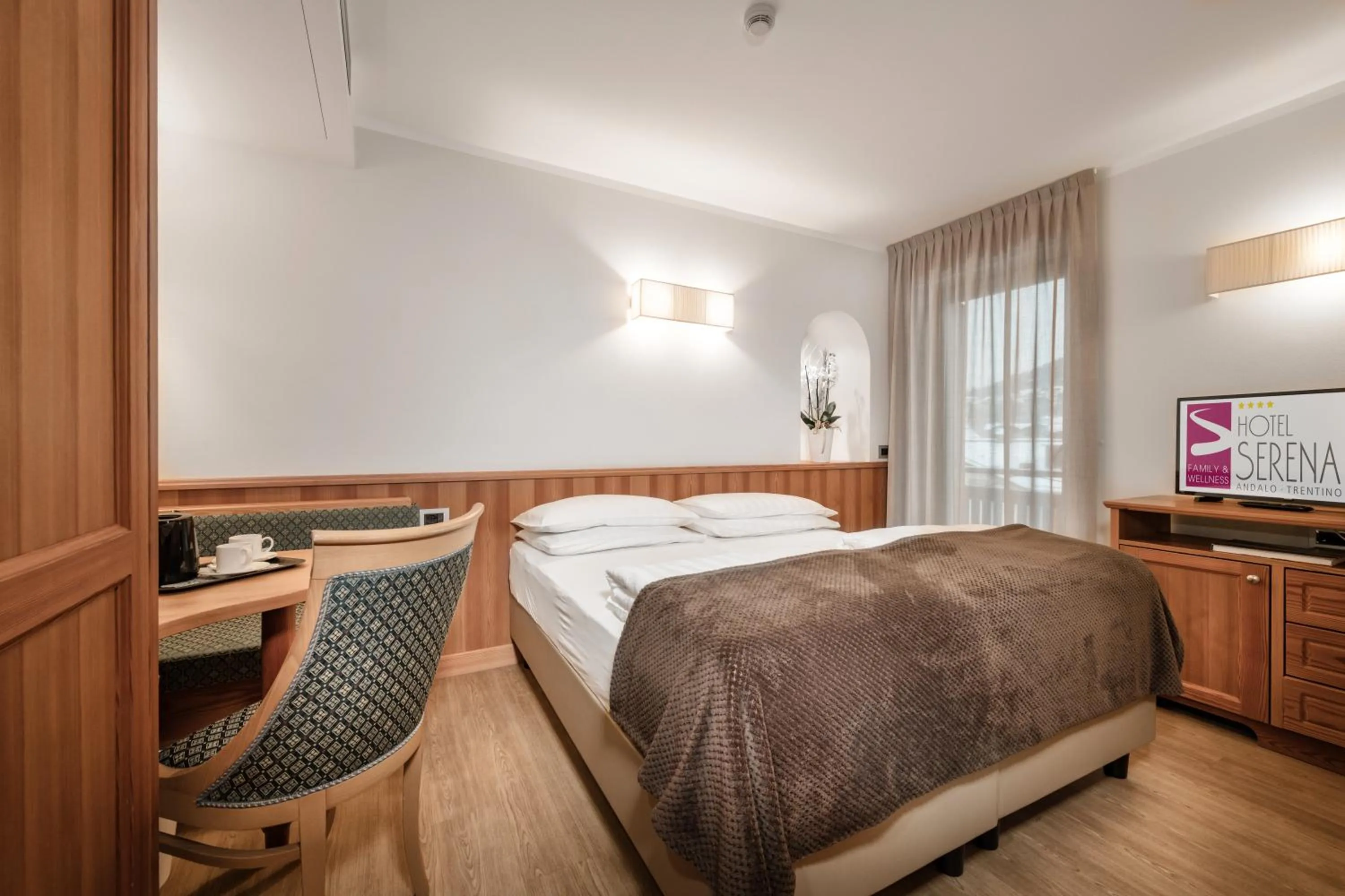 Bed in Family Hotel Serena