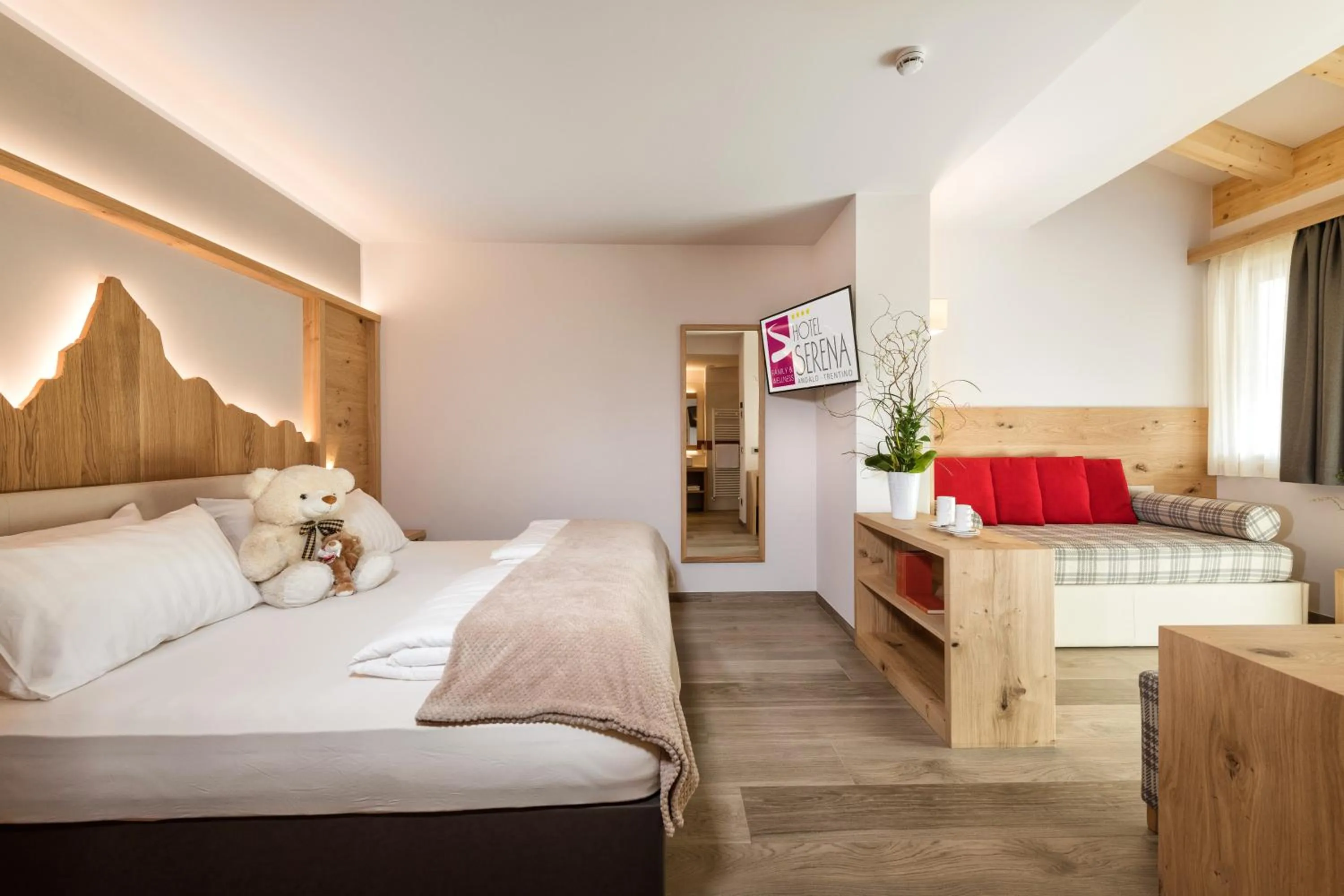 Bed in Family Hotel Serena