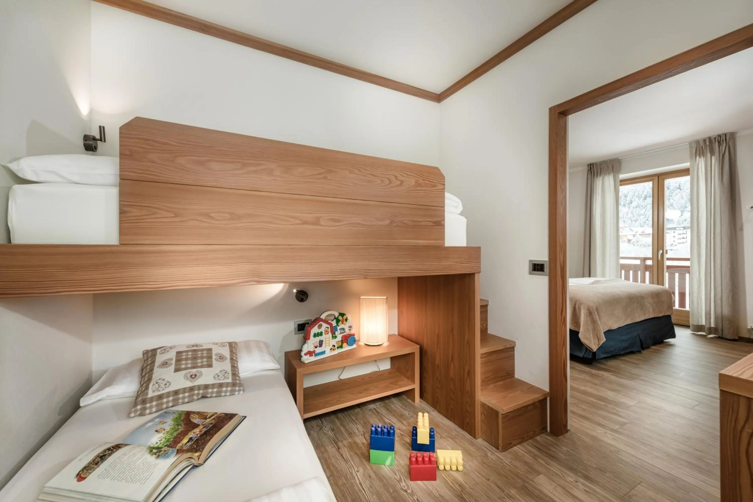 Bed in Family Hotel Serena