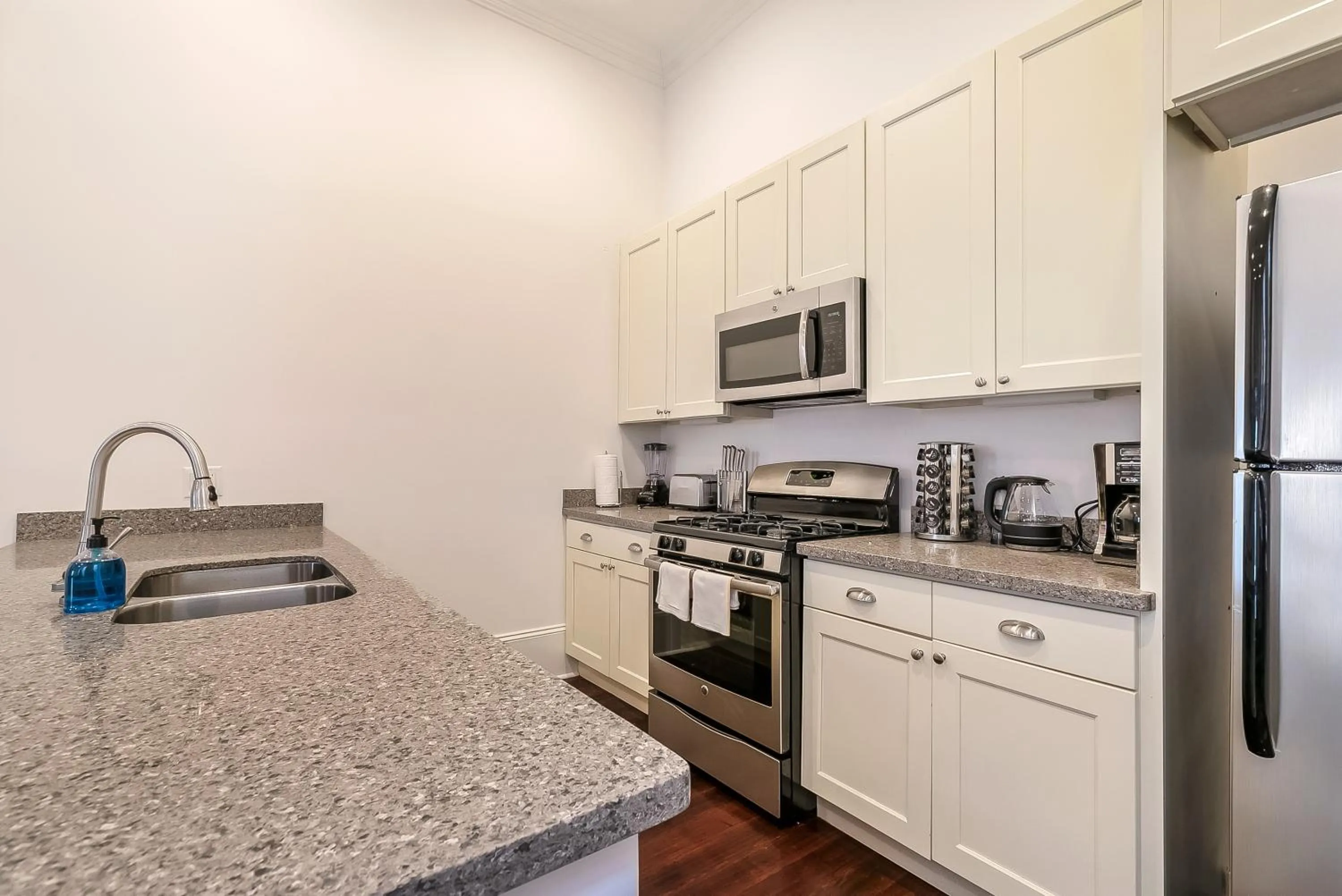 Kitchen or kitchenette in Charming 2BR on Carondelet by Hosteeva