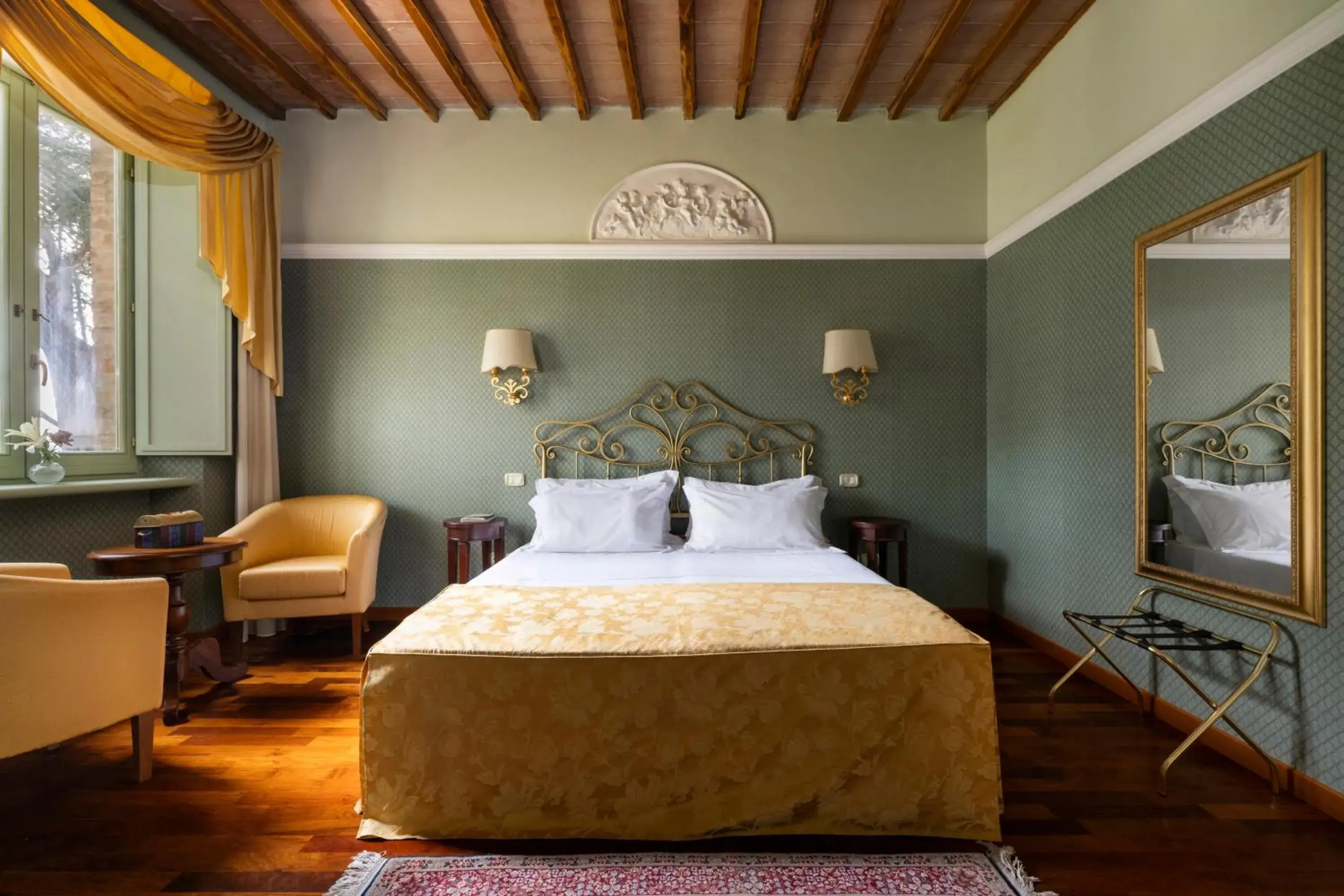 Bedroom in Relais Parco Dei Cavalieri Assisi Bedroom in Relais Parco Dei Cavalieri Assisi