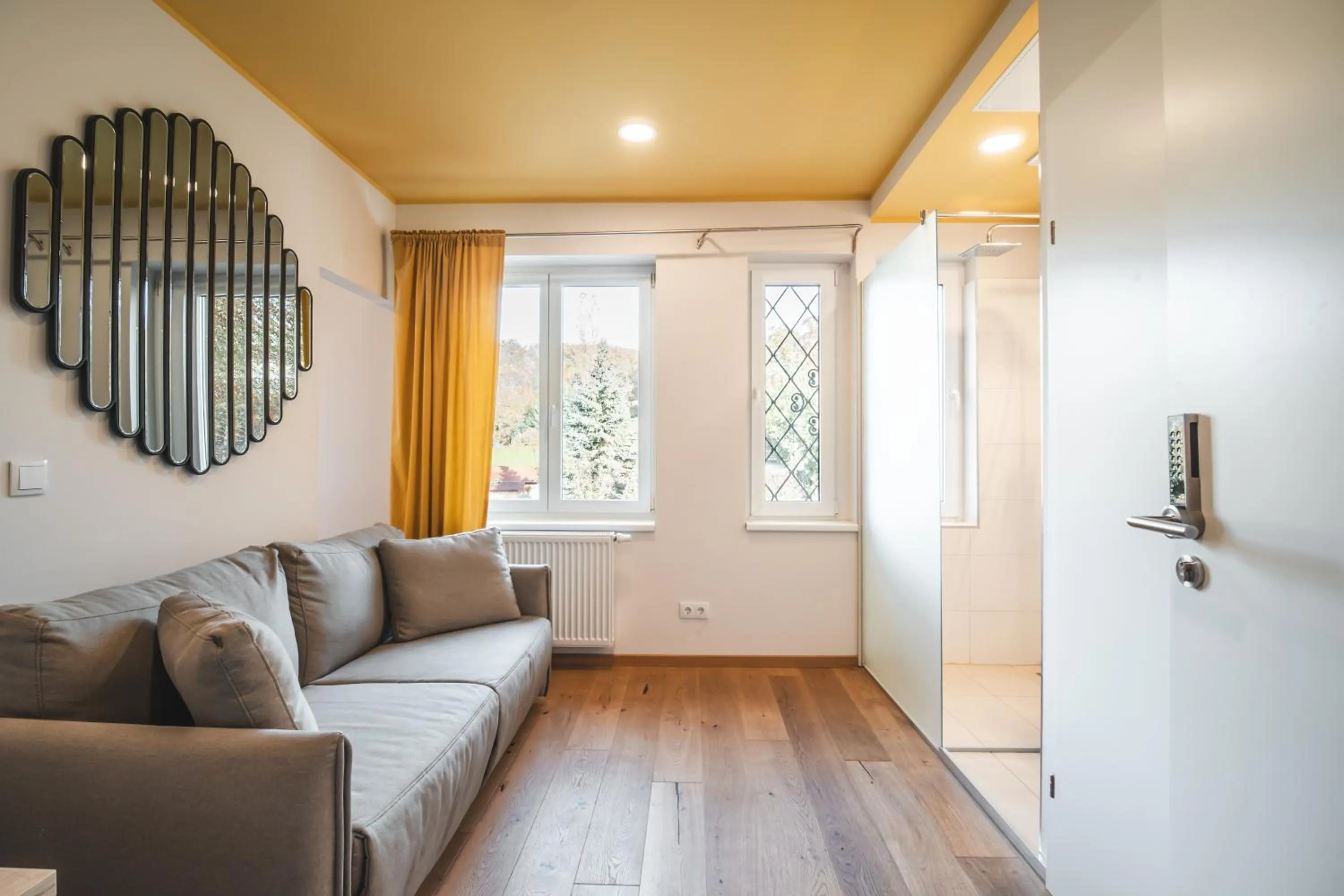 Living room in Boutiquehotel Caravella Velden by S4Y