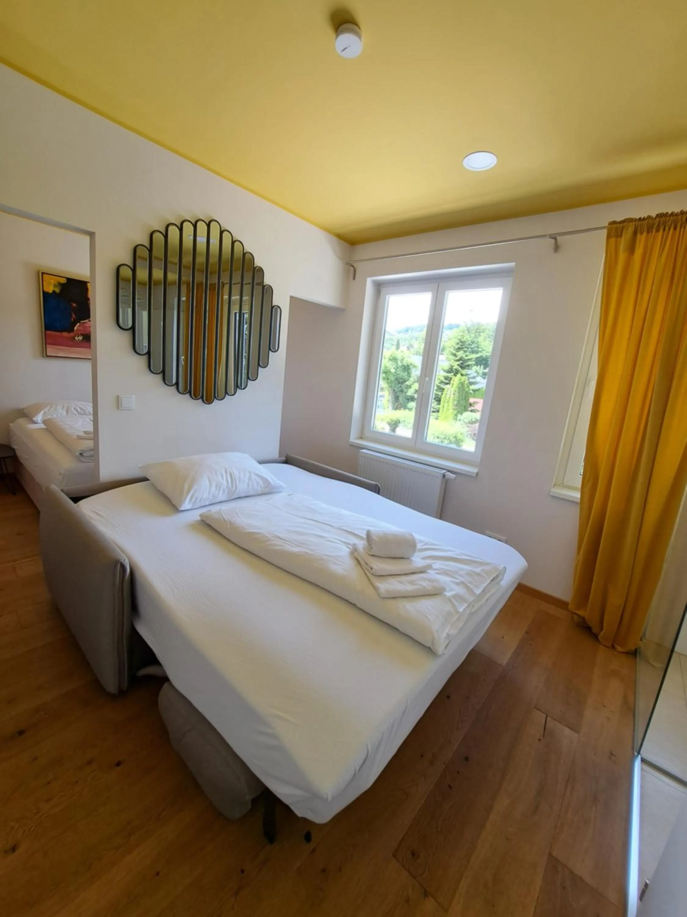 Photo of the whole room, Bed in Boutiquehotel Caravella Velden by S4Y