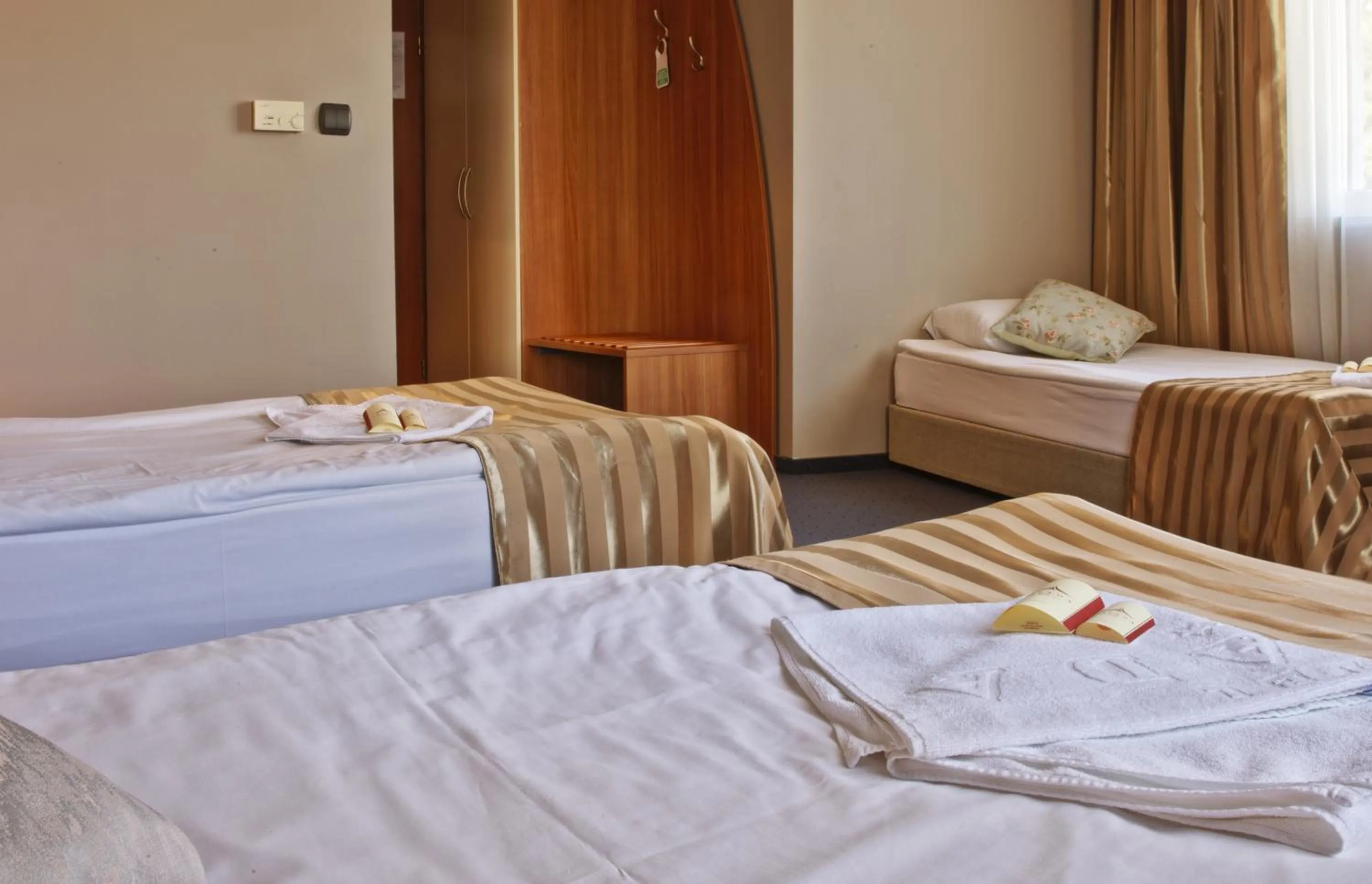 Bedroom in Triada Hotel