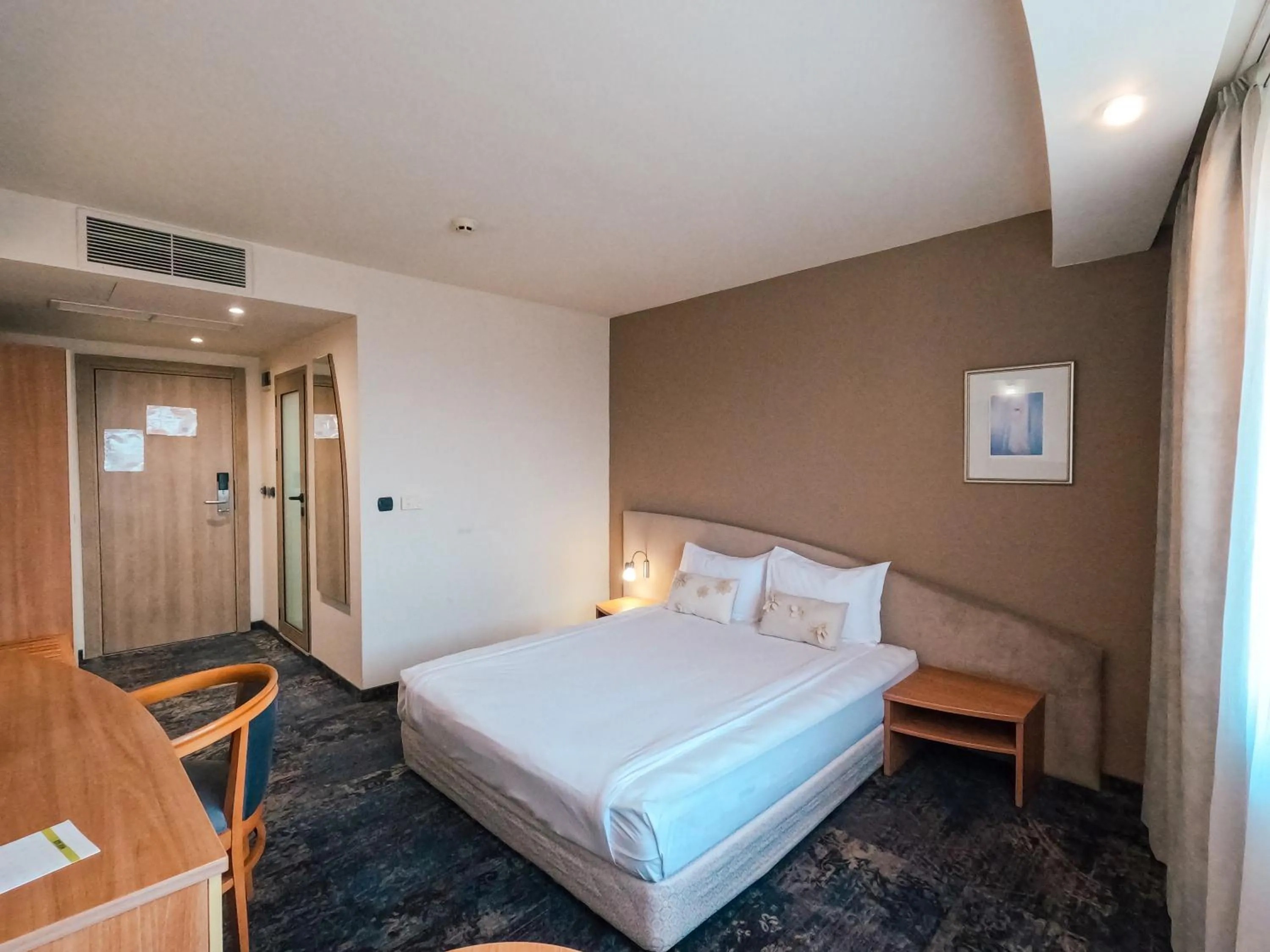 Photo of the whole room, Bed in Triada Hotel