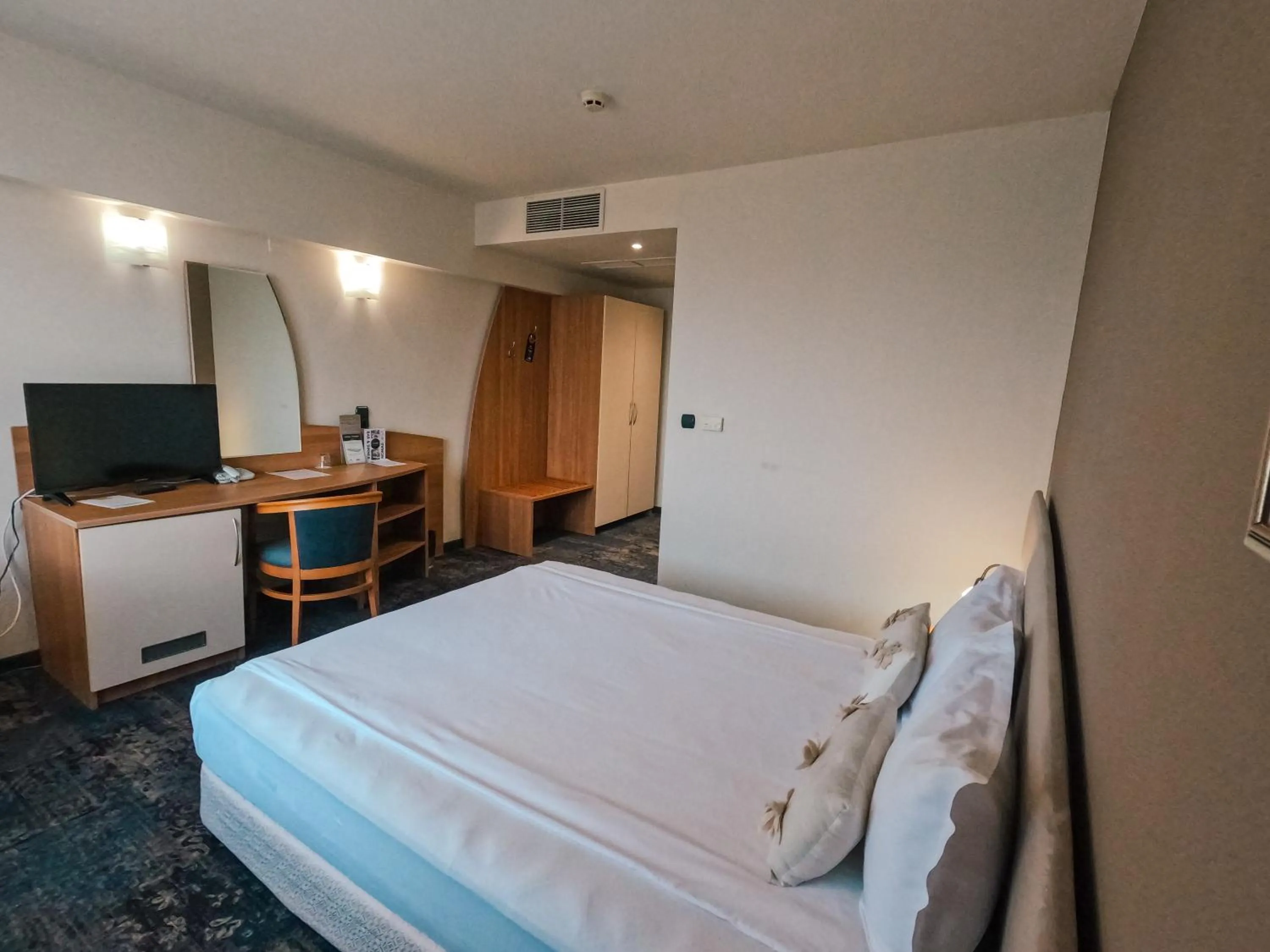 Photo of the whole room, Bed in Triada Hotel