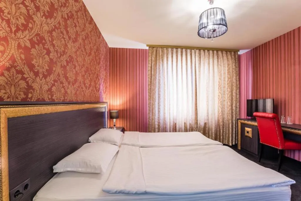 Bed in Hotel Elegance