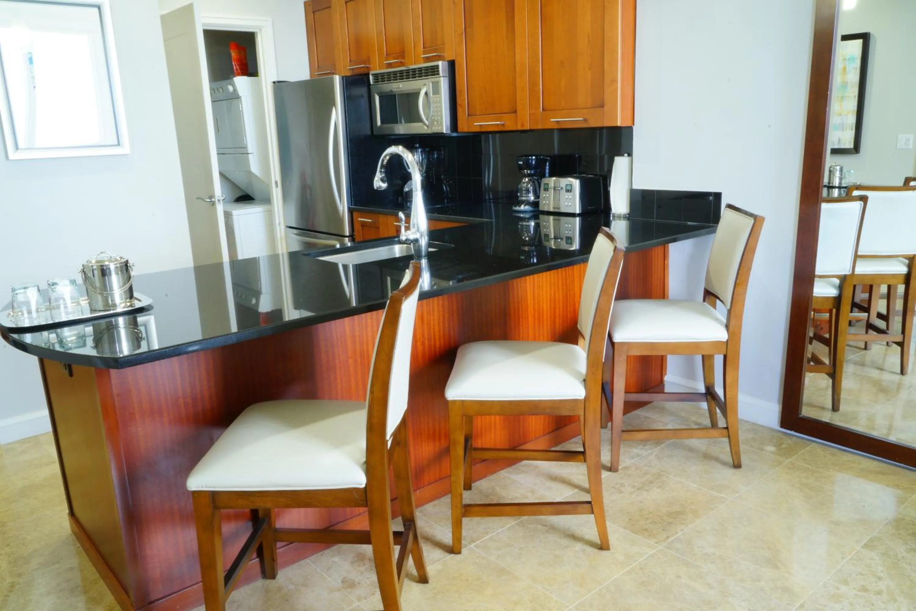 Kitchen or kitchenette in Palm Beach Singer Island Resort & Spa Luxury Suites