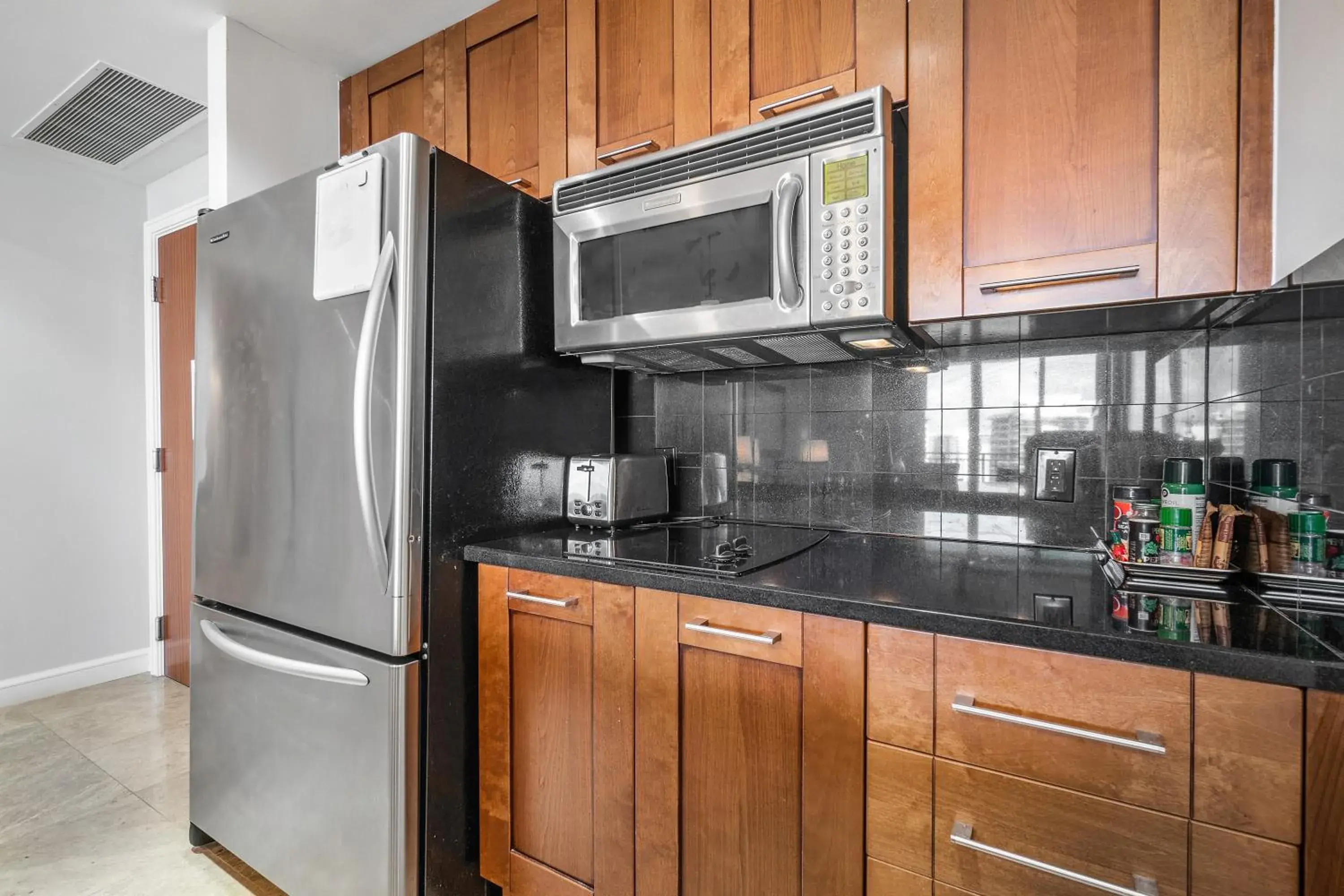 Kitchen/Kitchenette in Palm Beach Singer Island Resort & Spa Luxury Suites