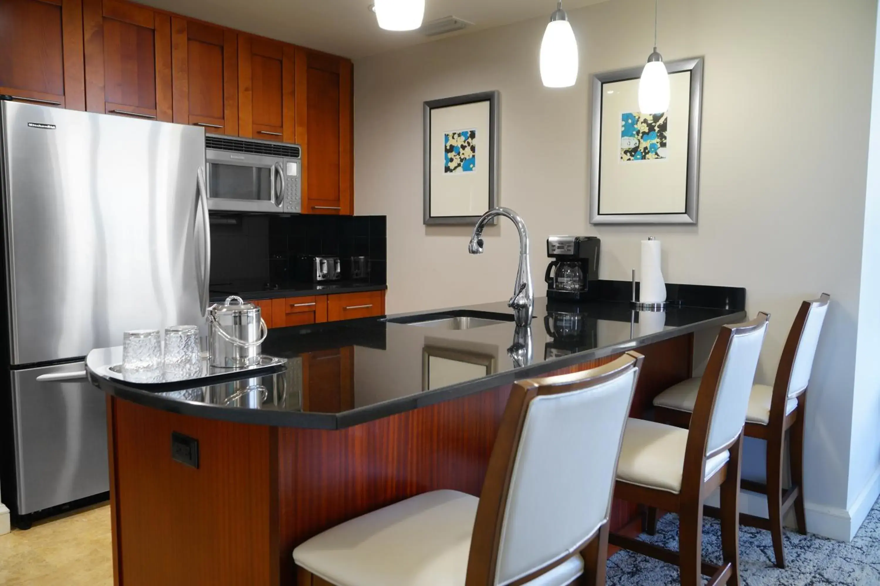 Kitchen/Kitchenette in Palm Beach Singer Island Resort & Spa Luxury Suites