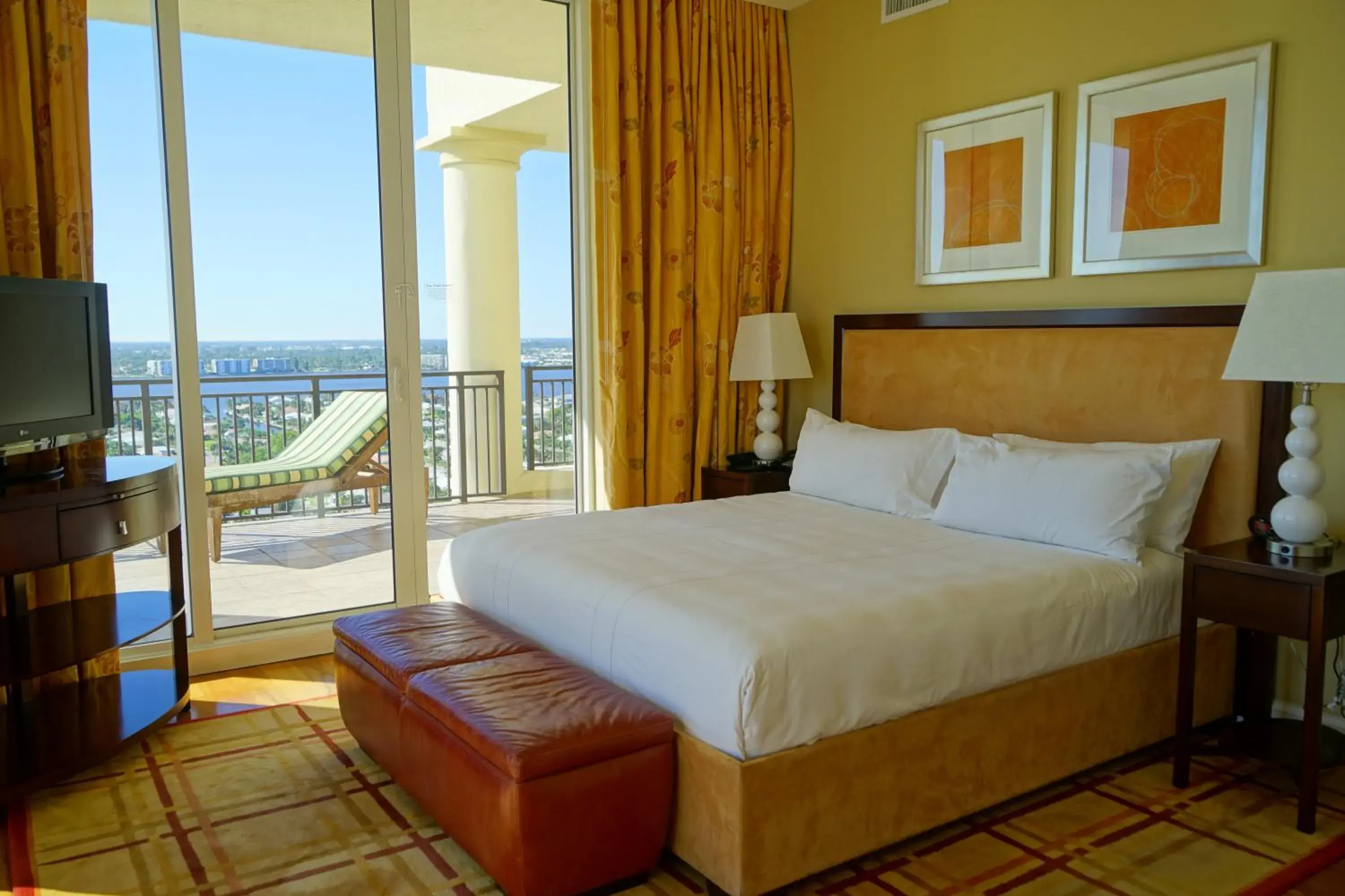 Bed in Palm Beach Singer Island Resort & Spa Luxury Suites