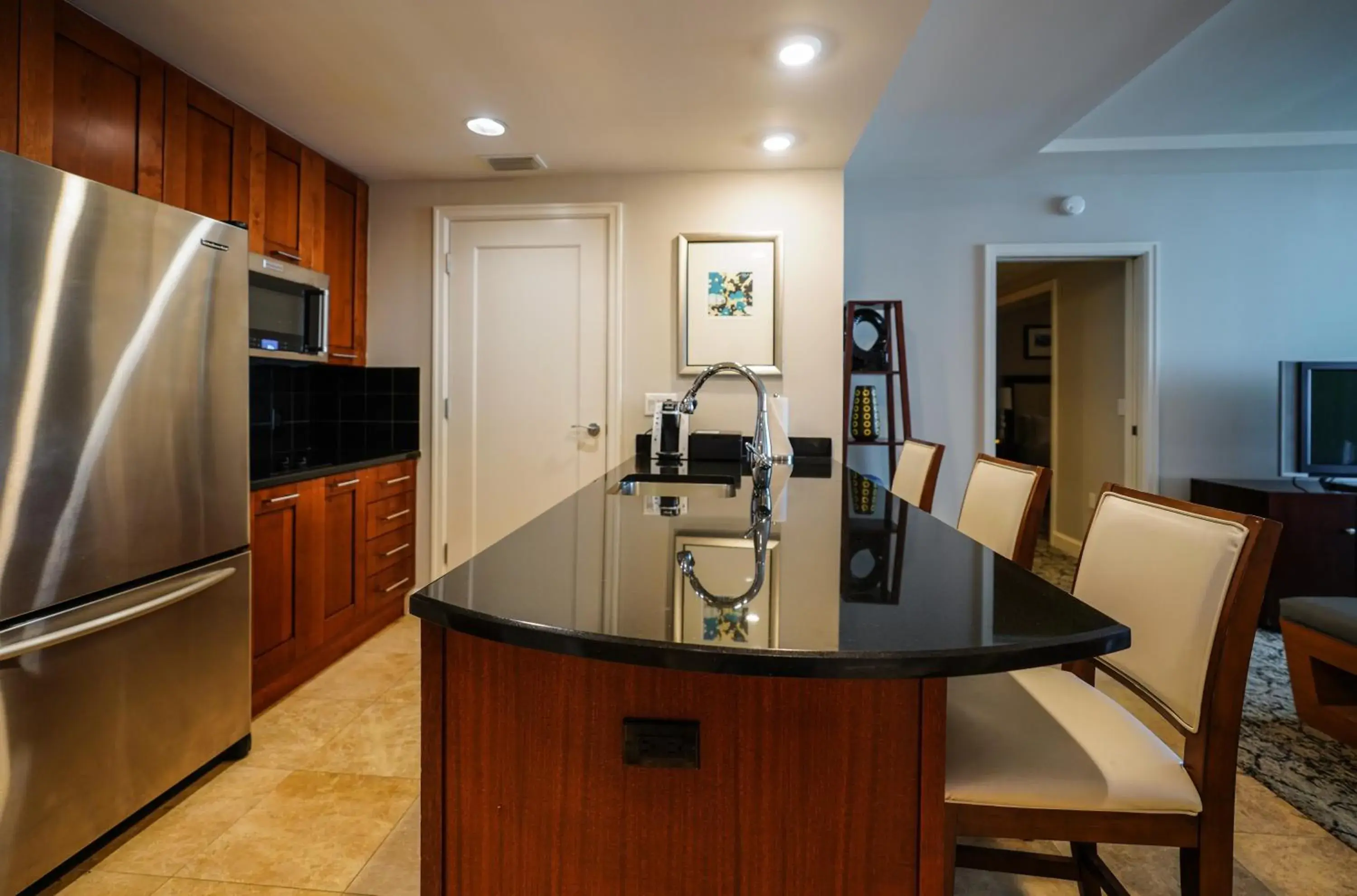 Kitchen/Kitchenette in Palm Beach Singer Island Resort & Spa Luxury Suites