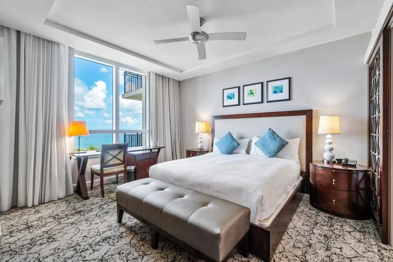 Bed in Palm Beach Singer Island Resort & Spa Luxury Suites