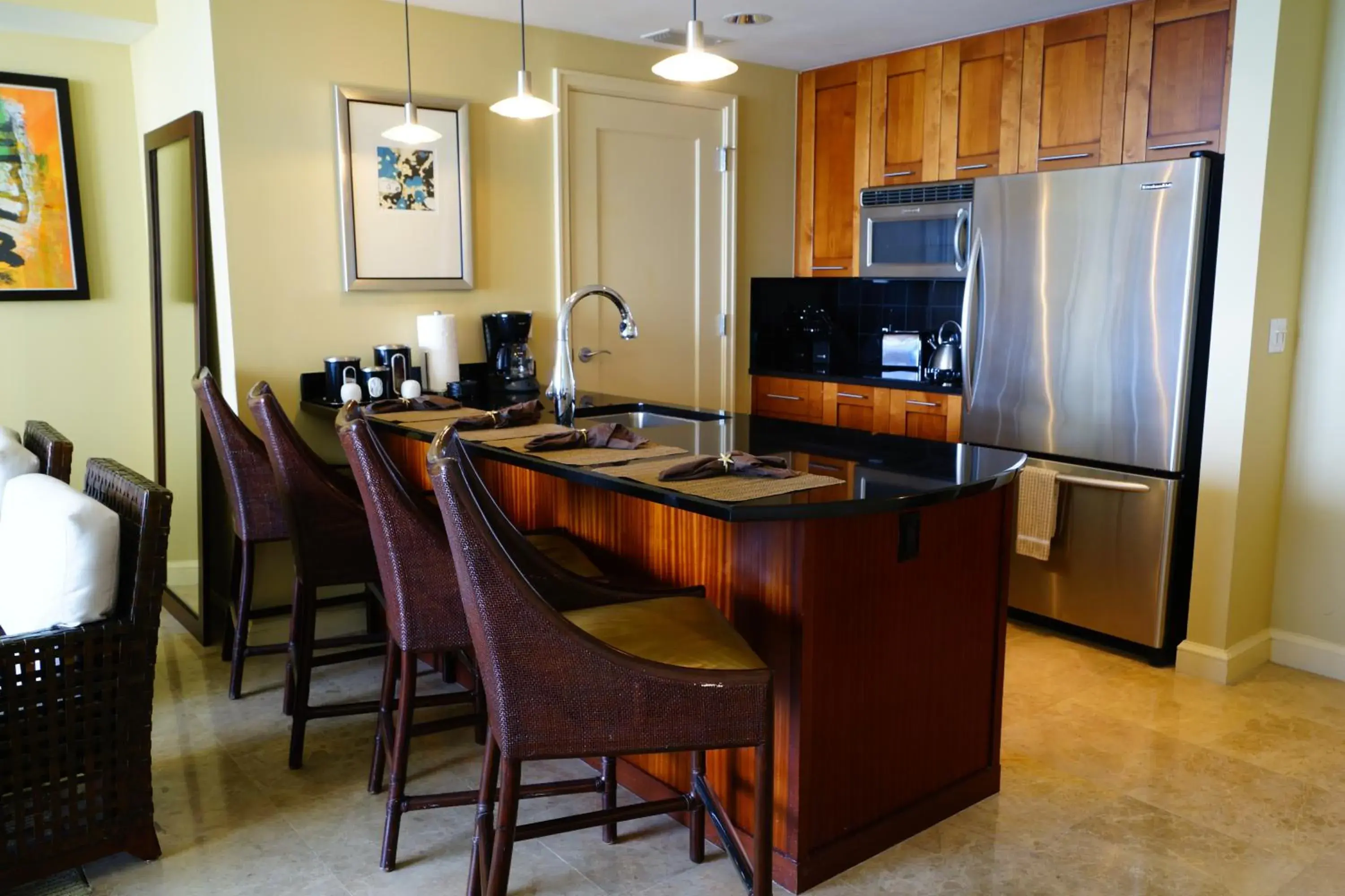 Kitchen/Kitchenette in Palm Beach Singer Island Resort & Spa Luxury Suites