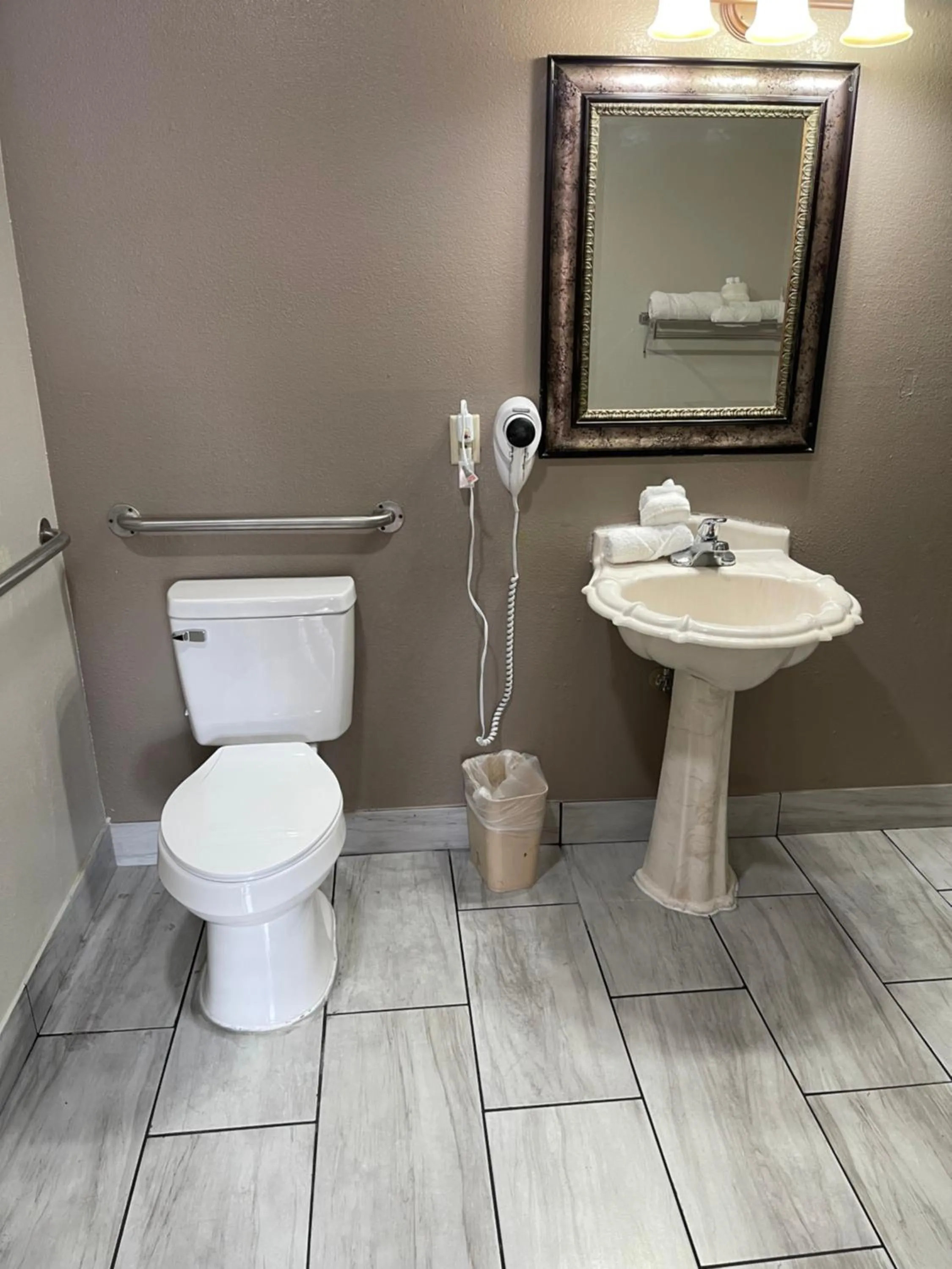 Toilet in Travelodge by Wyndham Tucson AZ