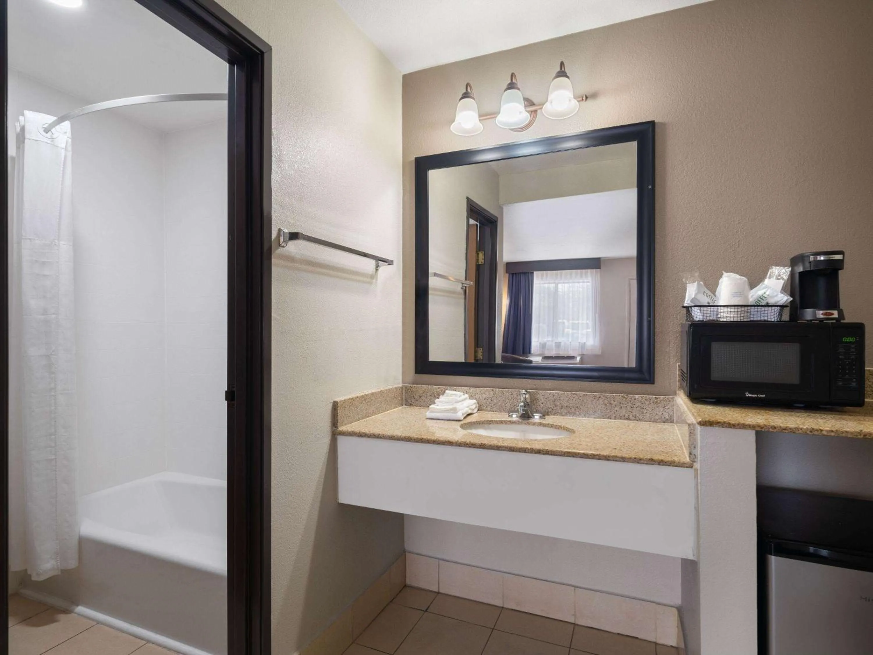 TV and multimedia in Travelodge by Wyndham Tucson AZ