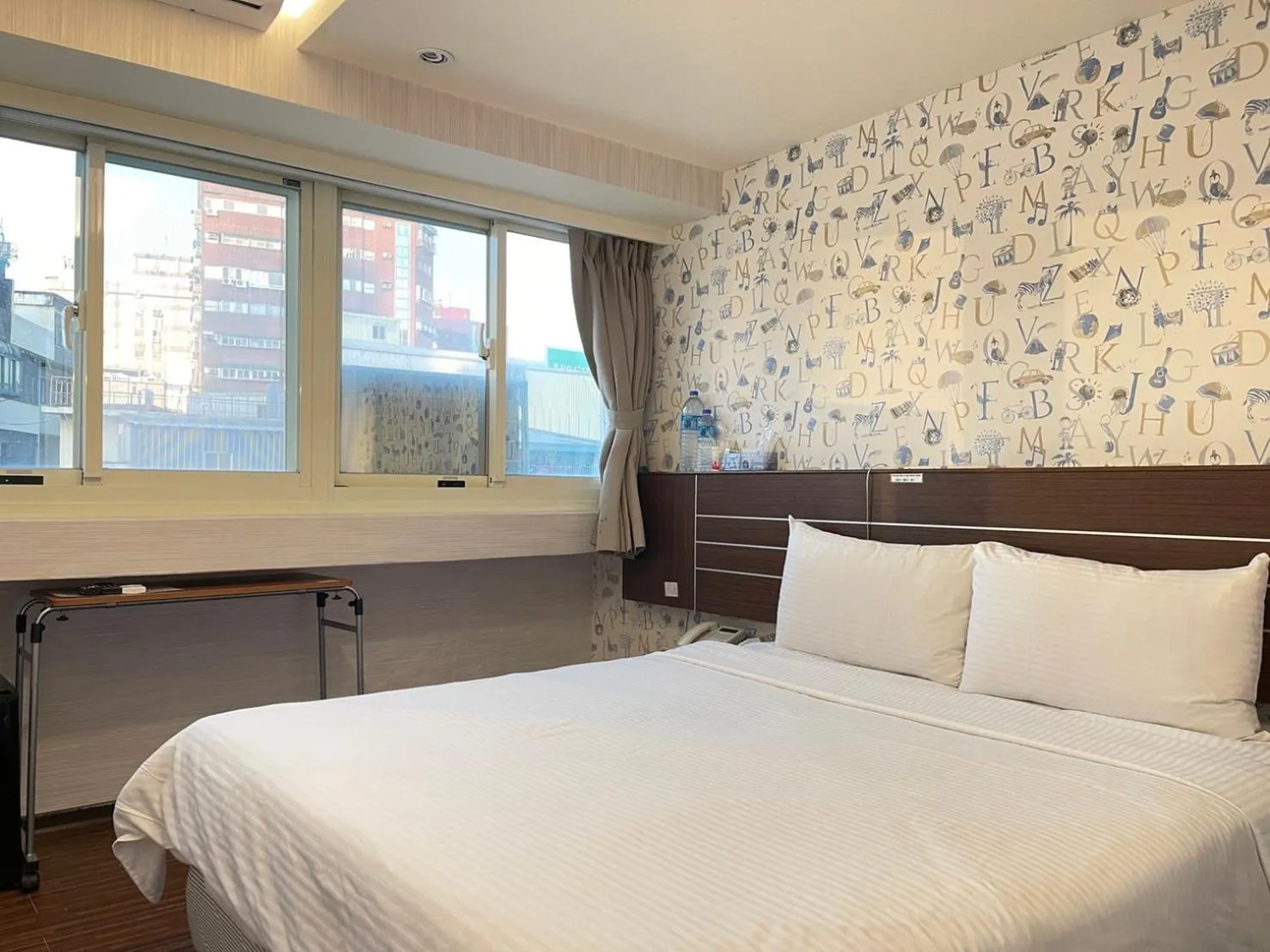 Bed in Jung Shin Hotel