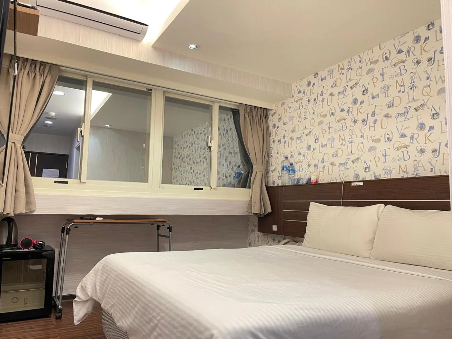 Bed in Jung Shin Hotel