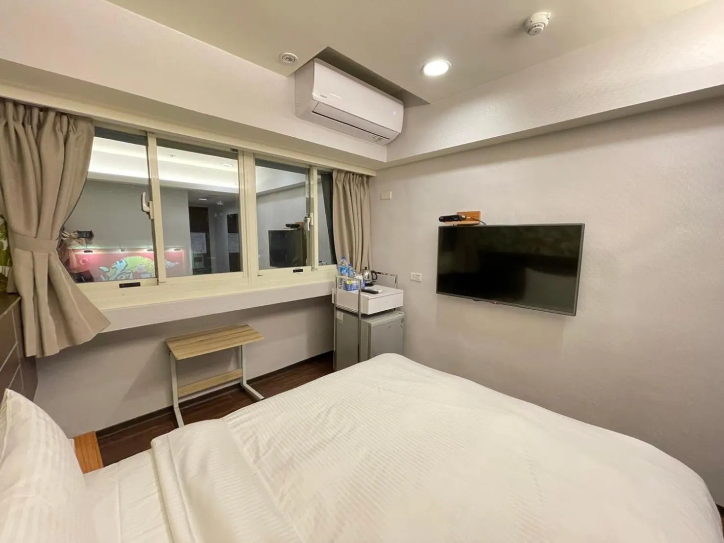 Bed in Jung Shin Hotel