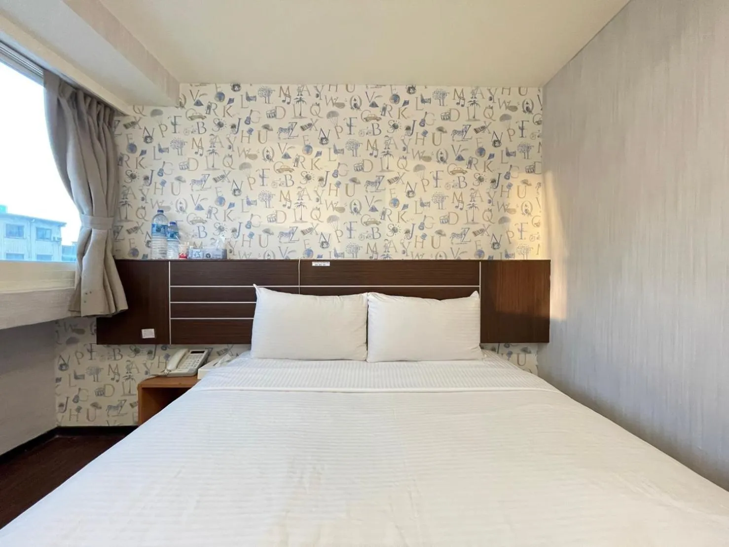 Bed in Jung Shin Hotel