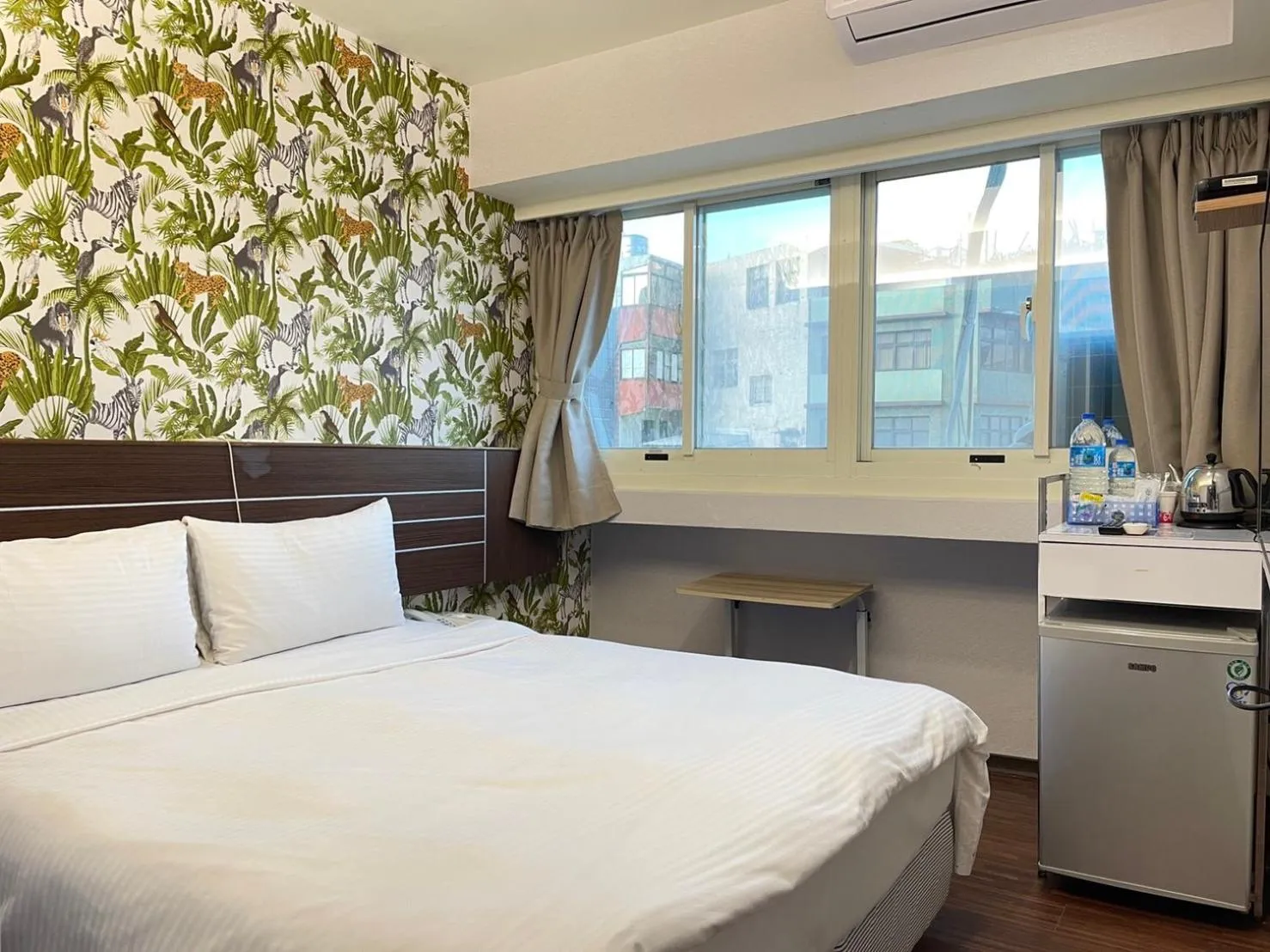 Bed in Jung Shin Hotel