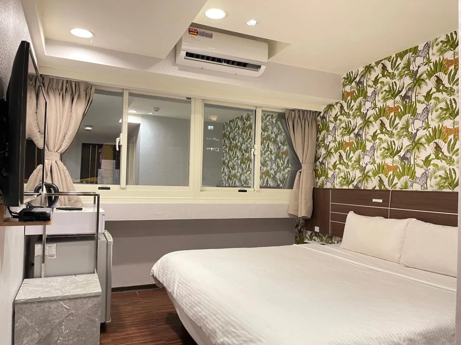 Bed in Jung Shin Hotel