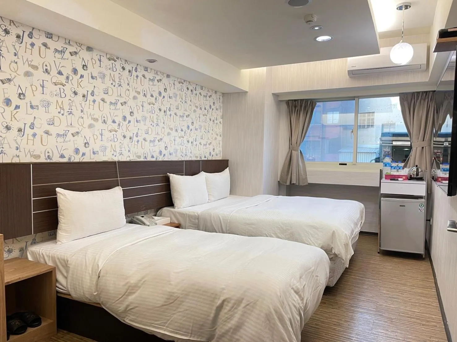 Bed in Jung Shin Hotel