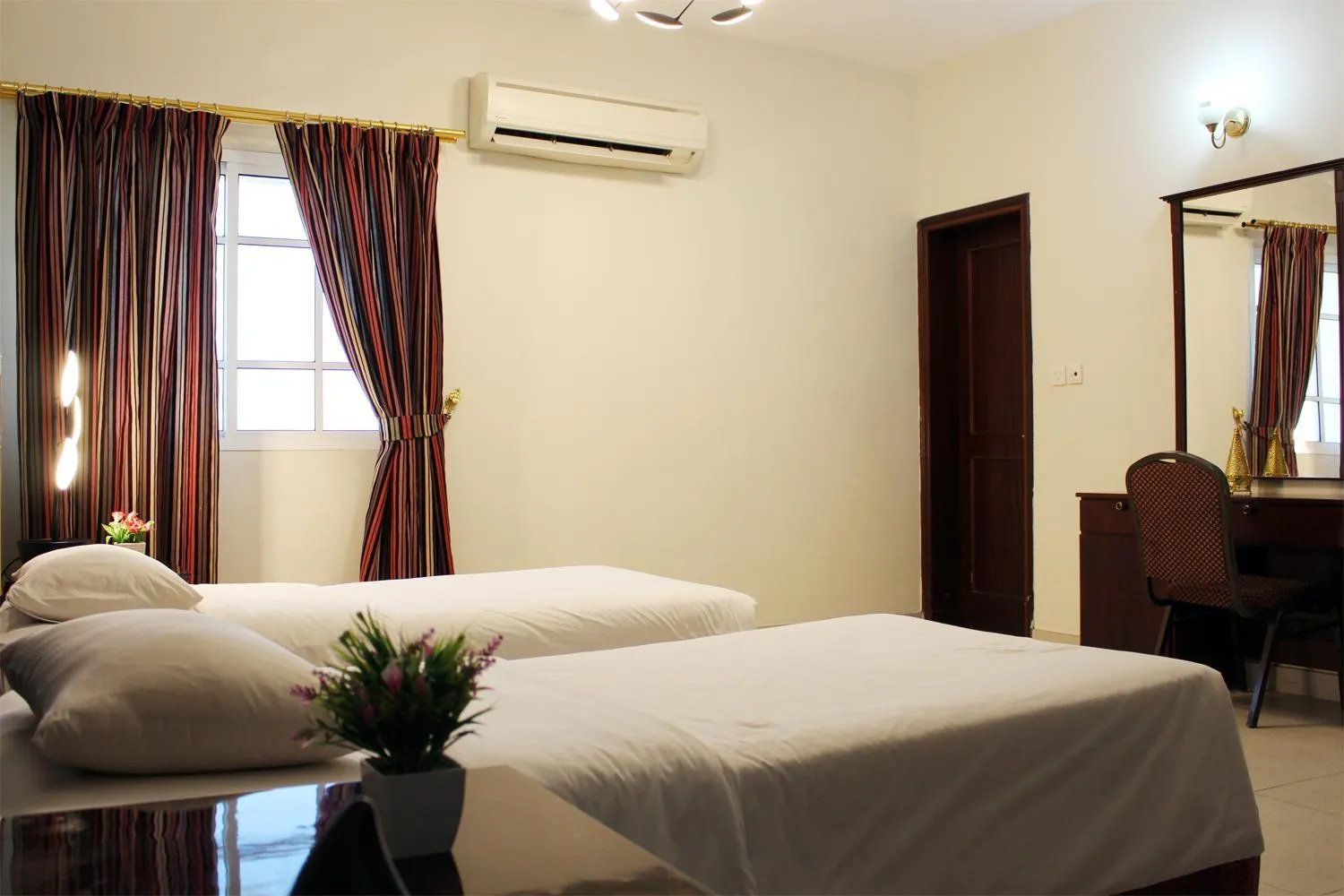 Bed in Sahara Hotel Apartments