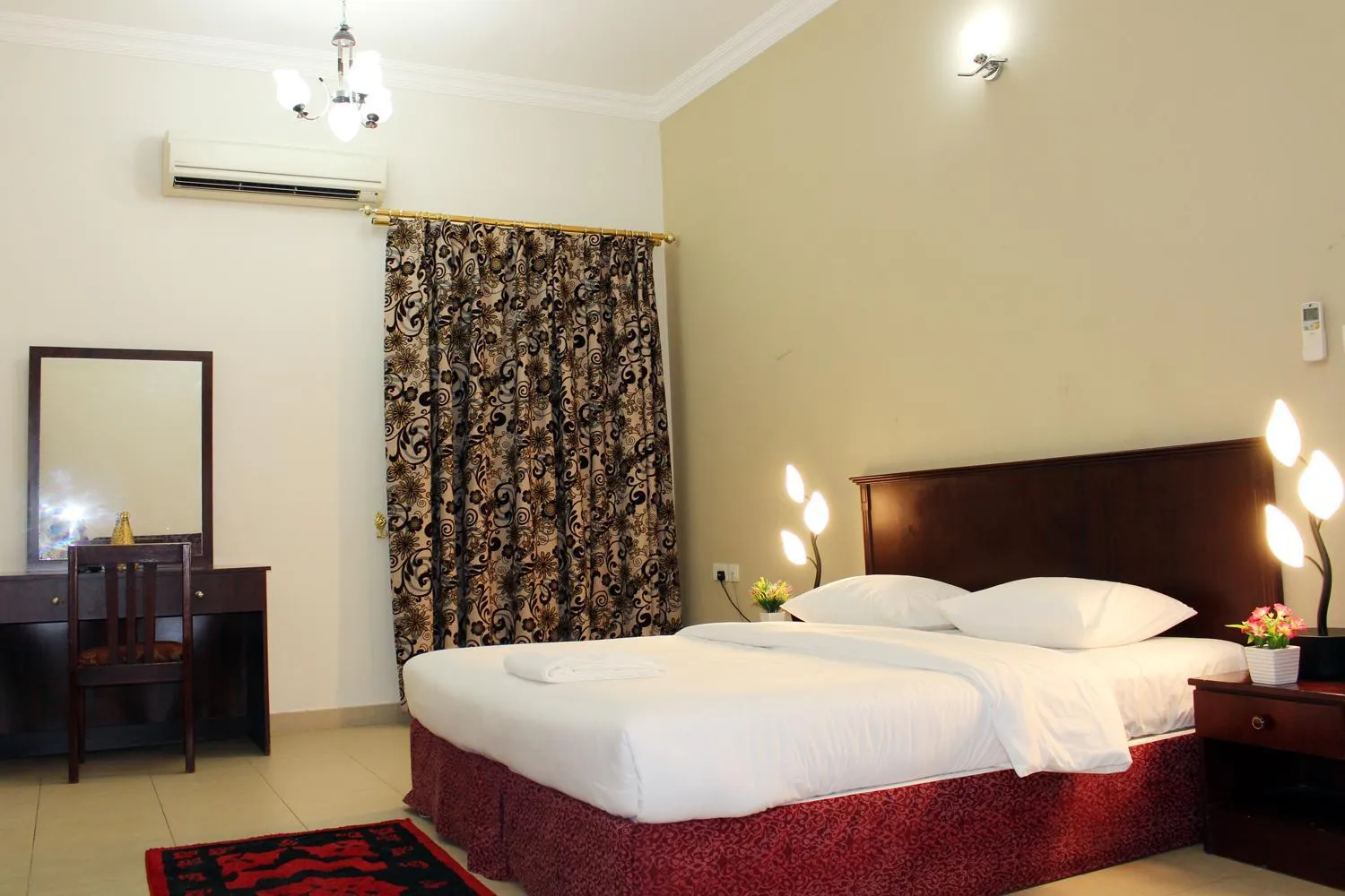 Bed in Sahara Hotel Apartments