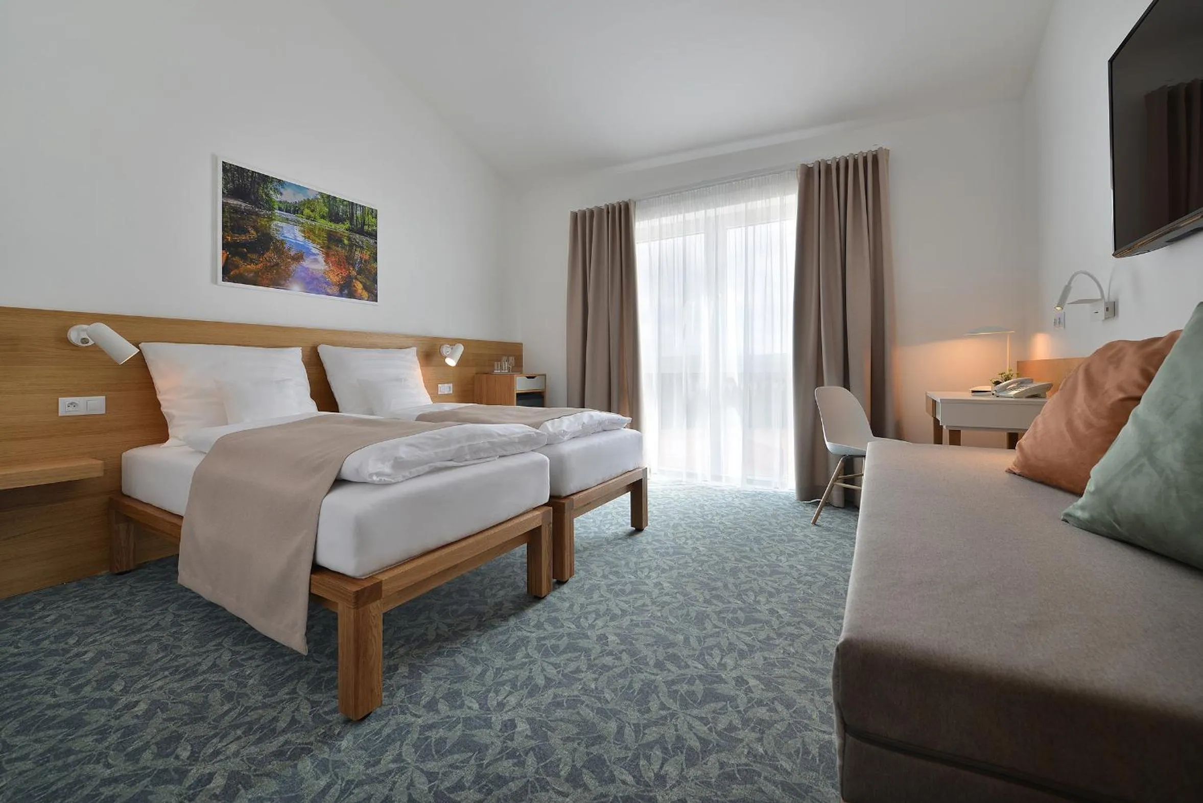 Seating area, Bed in Wellness Hotel Happy Star