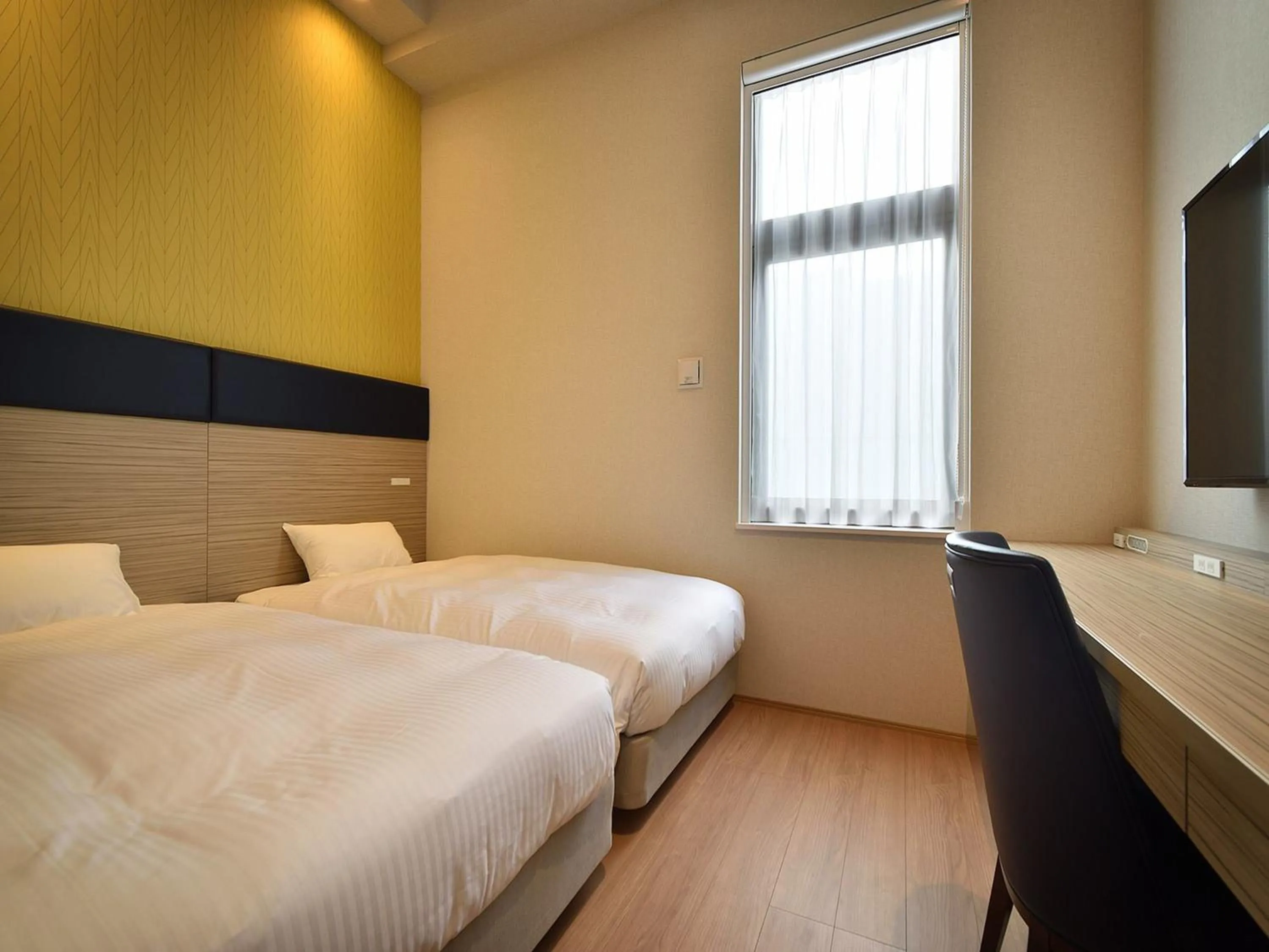 Photo of the whole room, Bed in Hotel WBF Grande Hakata