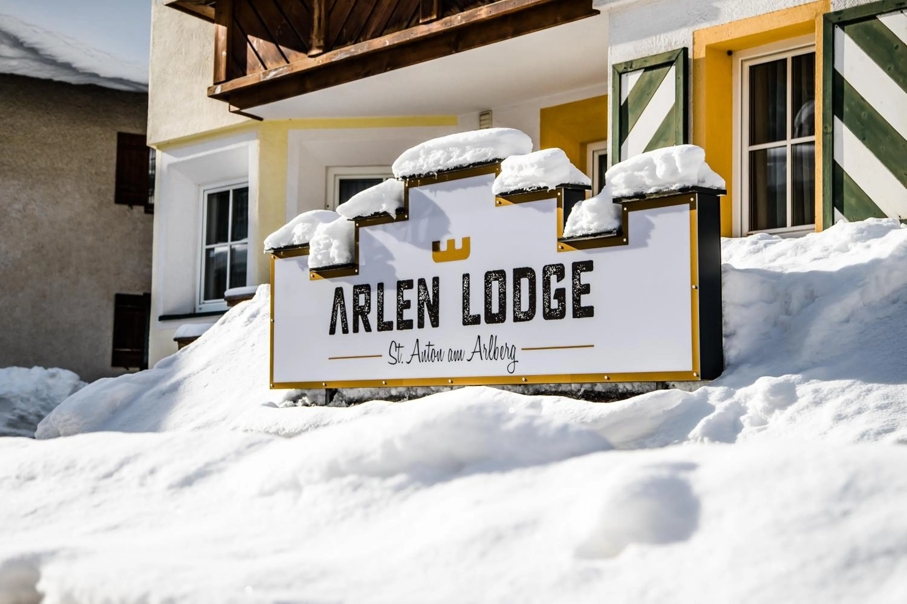 Property logo or sign in Arlen Lodge Hotel-Garni