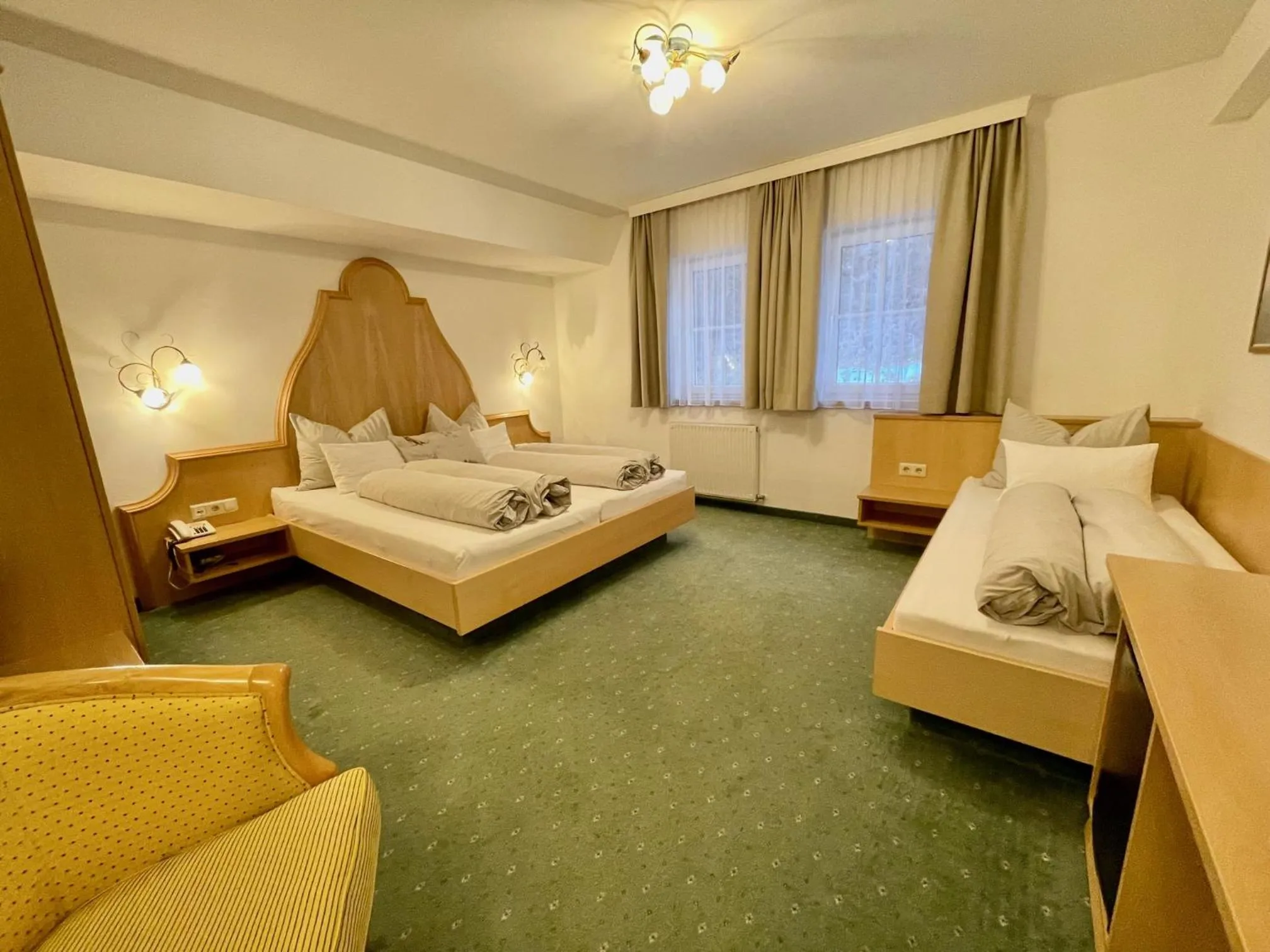 Bedroom, Bed in Arlen Lodge Hotel-Garni