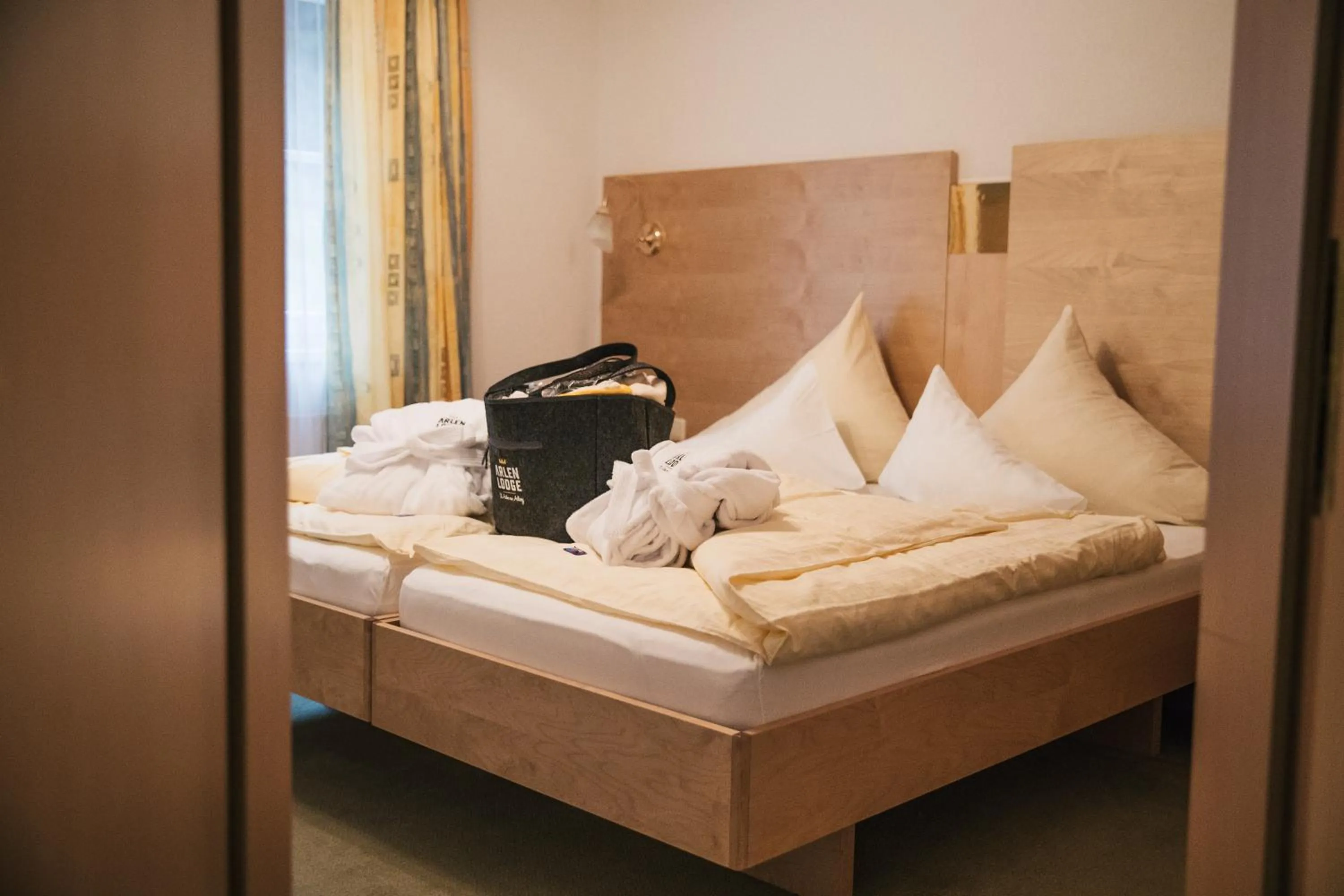 Photo of the whole room, Bed in Arlen Lodge Hotel-Garni