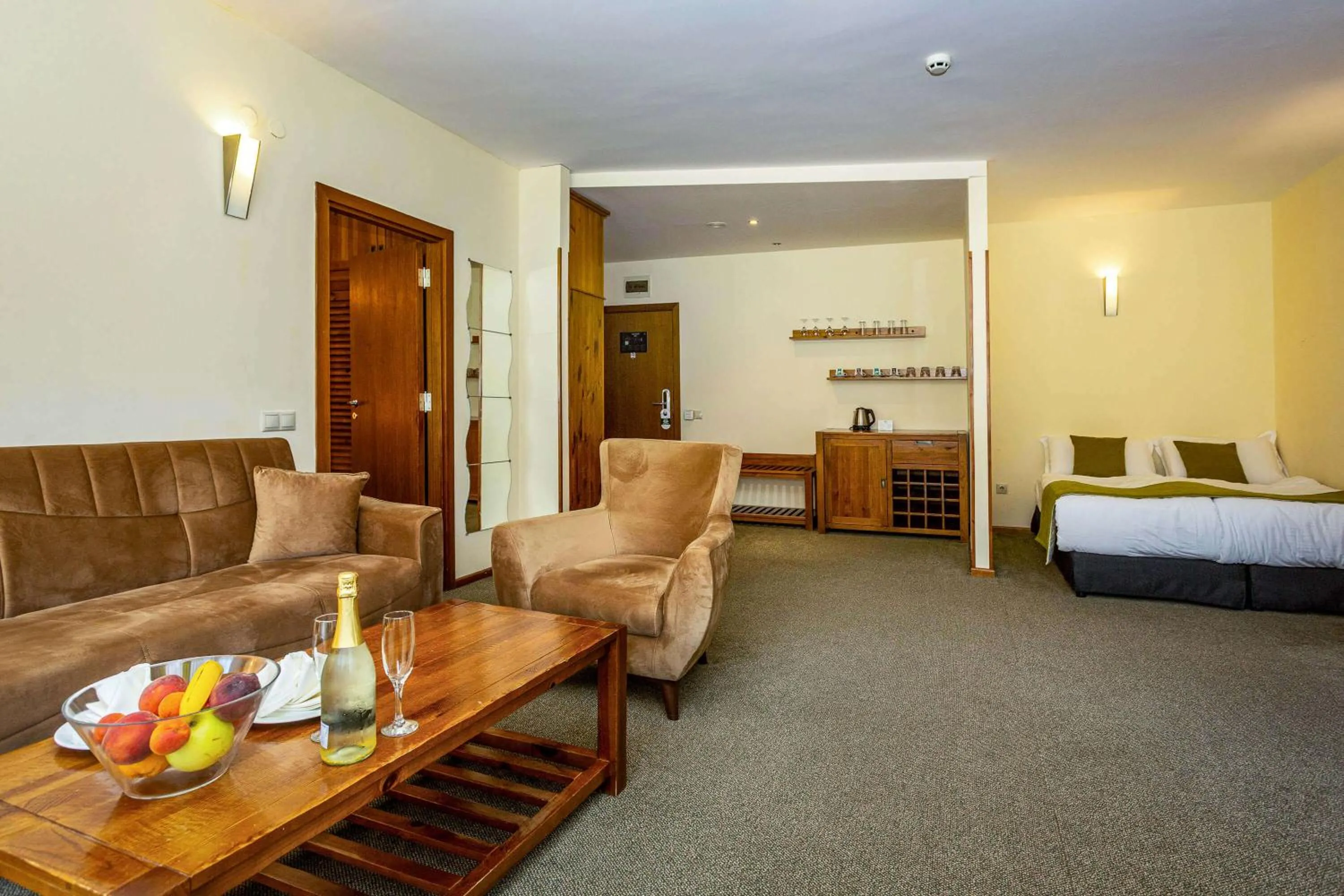 Living room, Bed in Musala Hotel