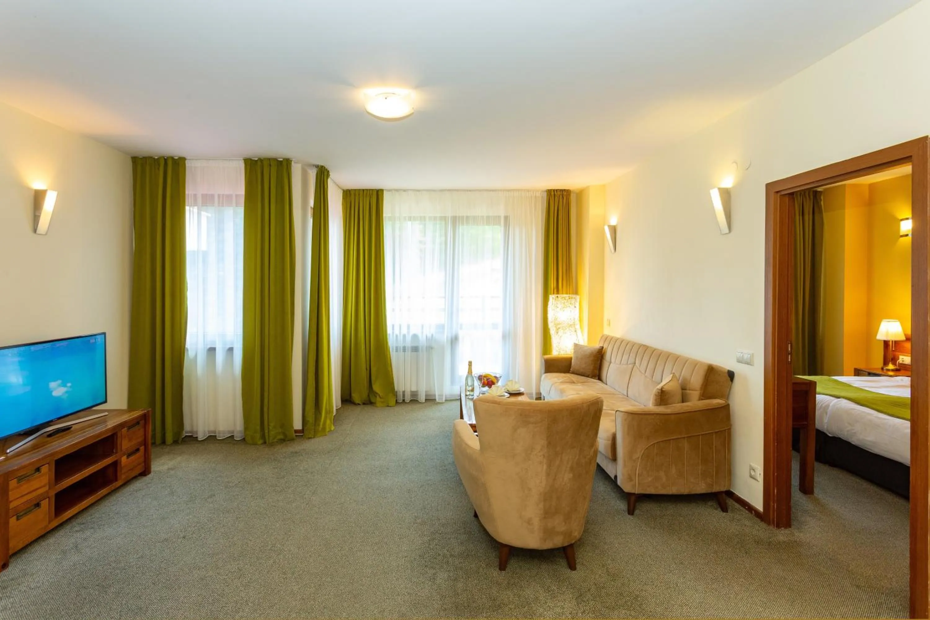 Living room, Bed in Musala Hotel