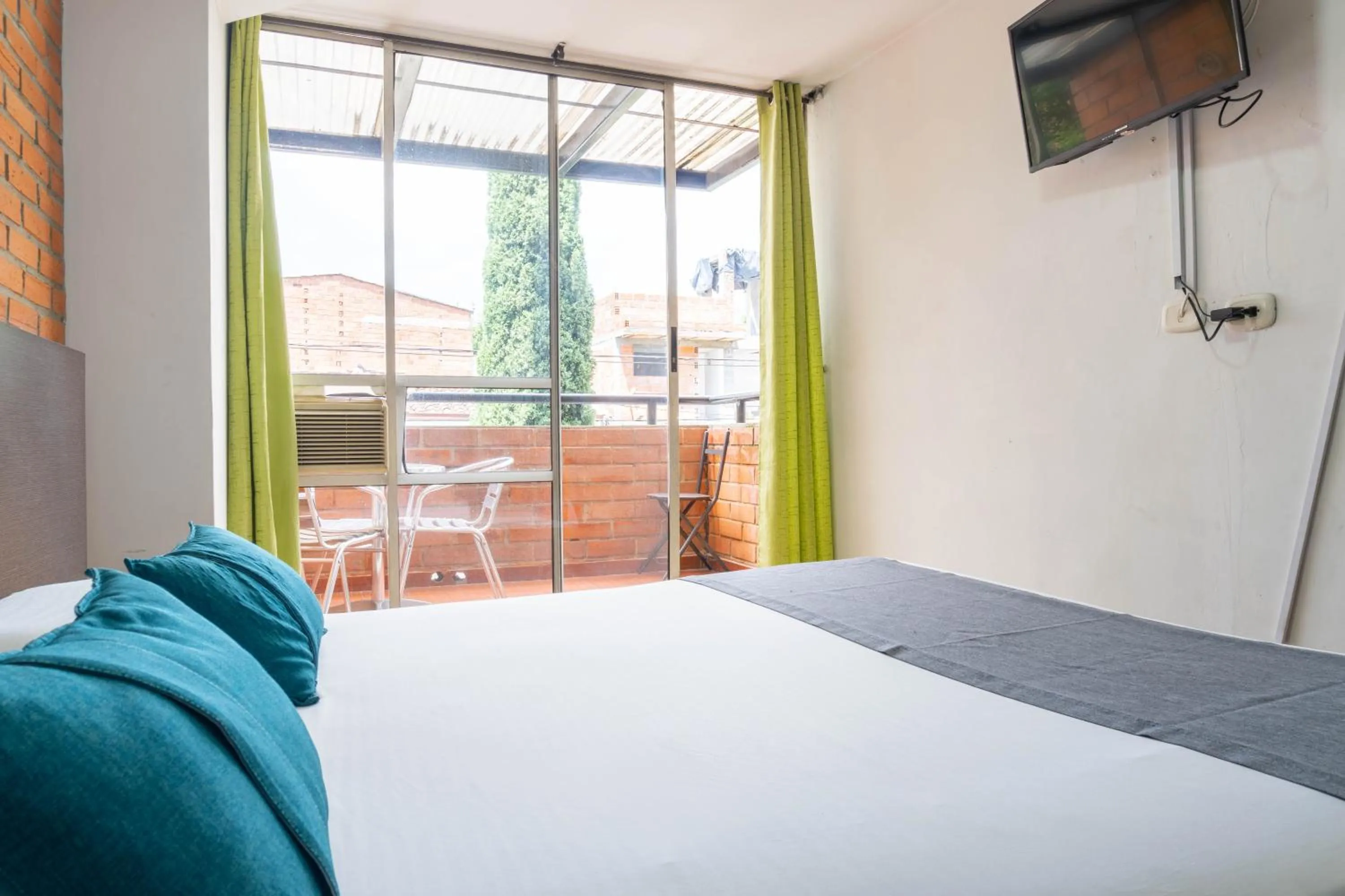 Bedroom in Hotel Casa Blanca Laureles