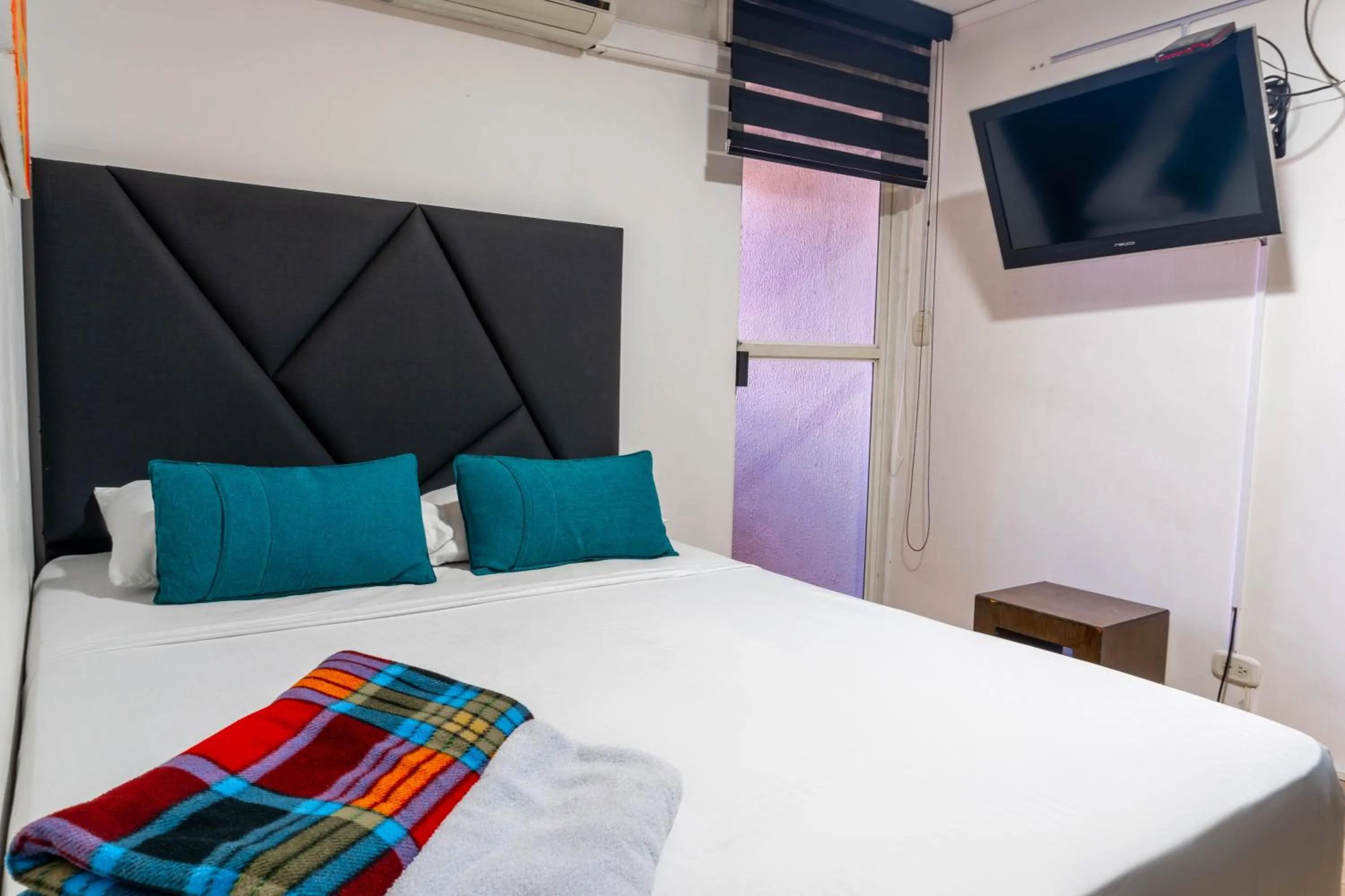 Bedroom in Hotel Casa Blanca Laureles