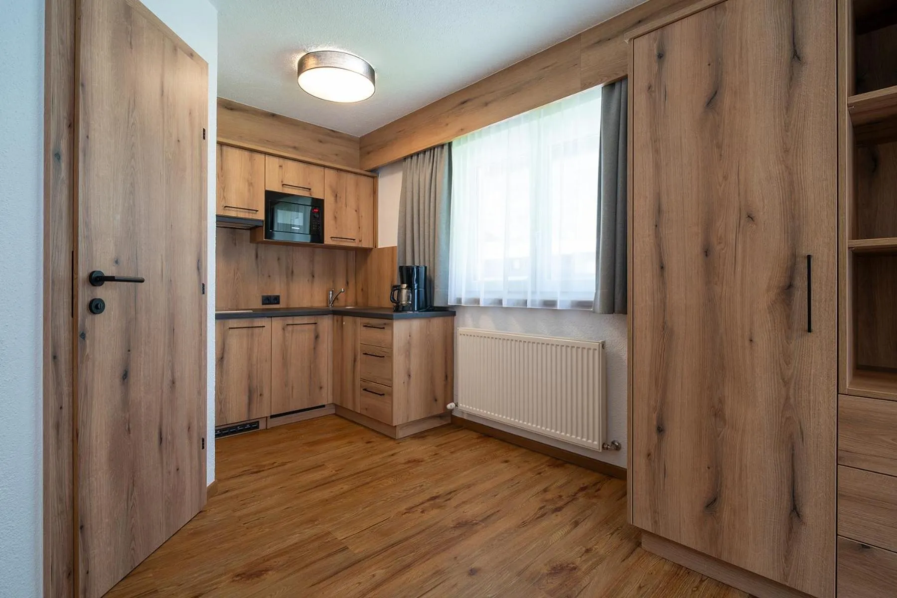 Kitchen or kitchenette in LEOPOLDINE Apart Zimmer