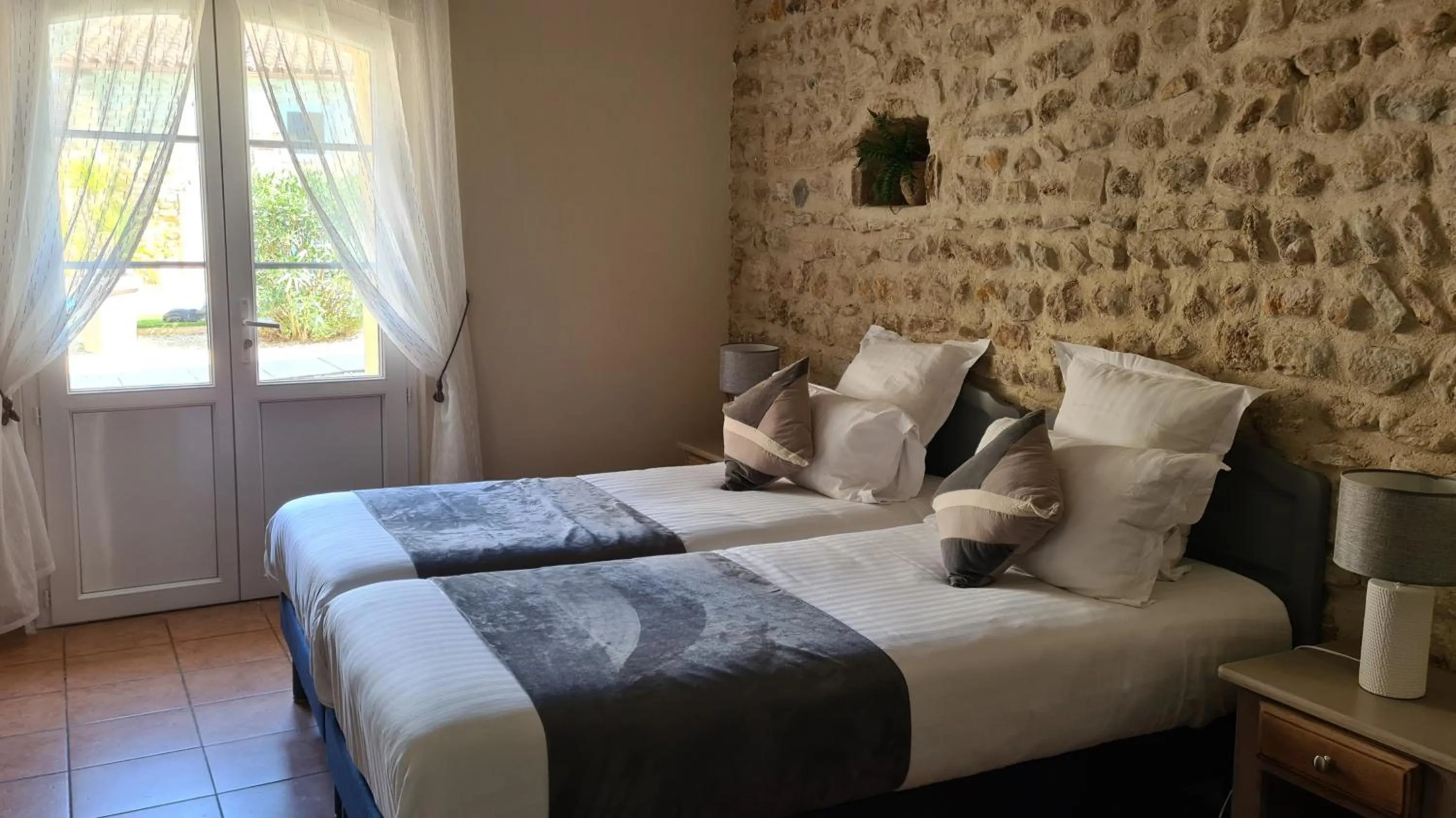 Bed in Logis Hôtel La Bastide Saint Bach