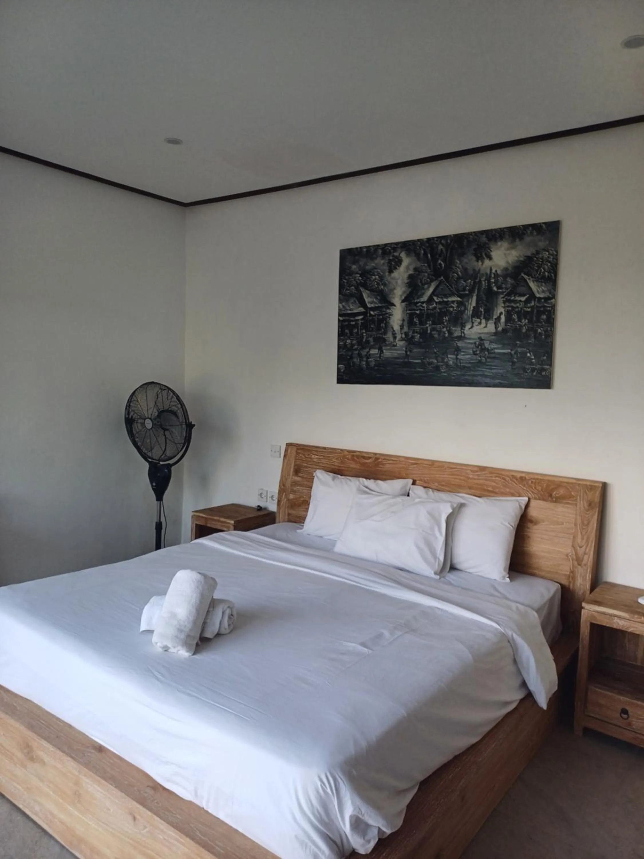 Bed in Green Bowl Beach Villas