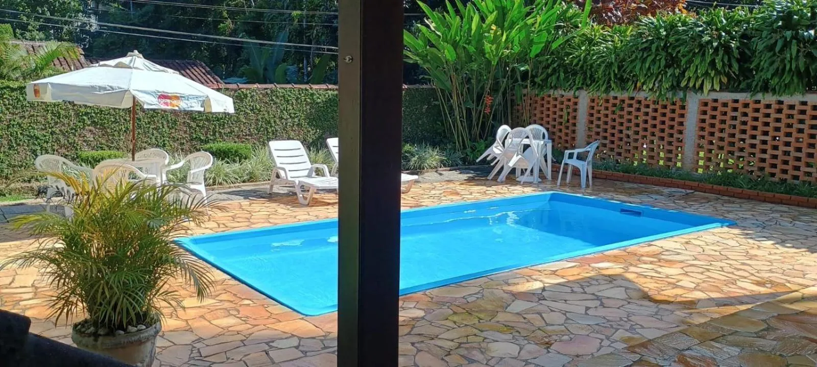 Swimming pool in Pousada Solar das Montanhas