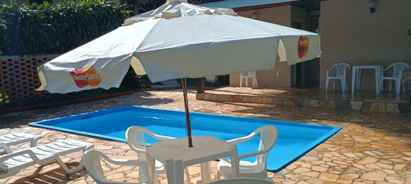 Swimming pool in Pousada Solar das Montanhas