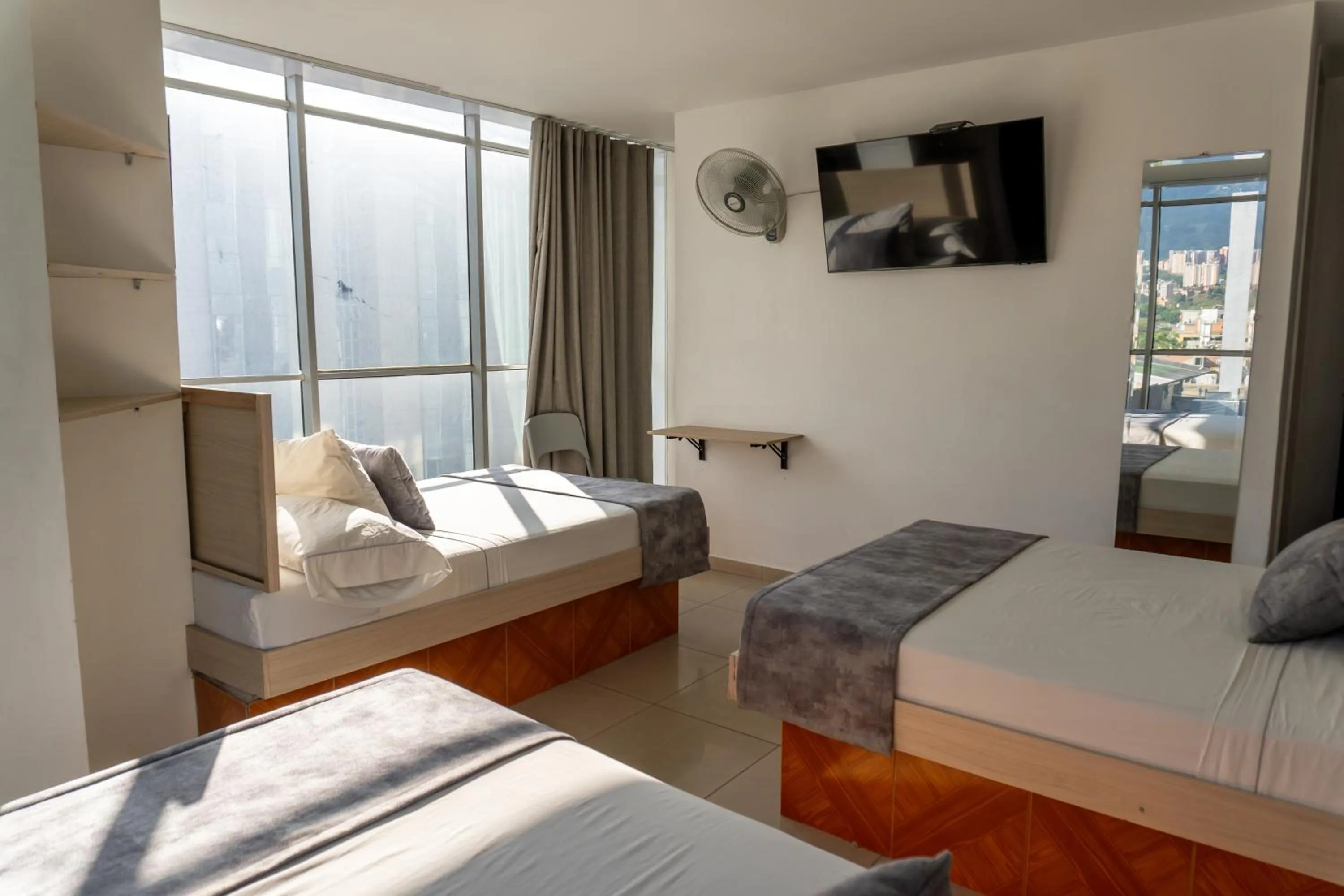 View (from property/room), Bed in Hotel Alcaravan Medellín