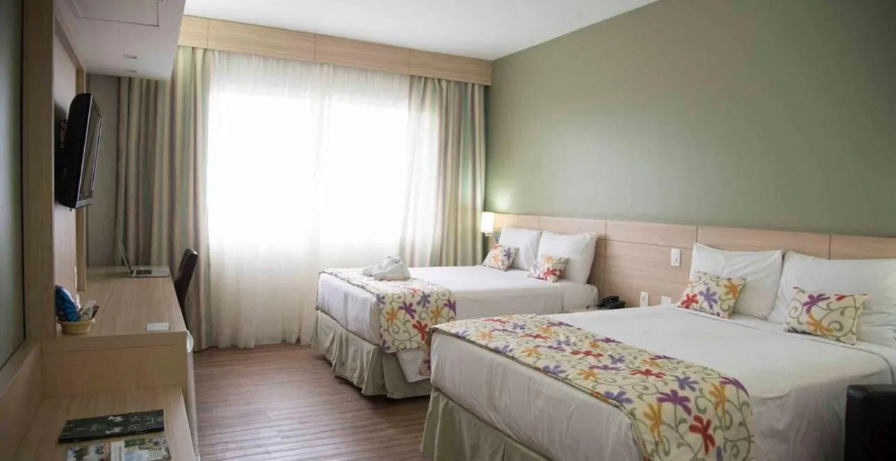 Bed in Tauá Hotel & Convention Caeté