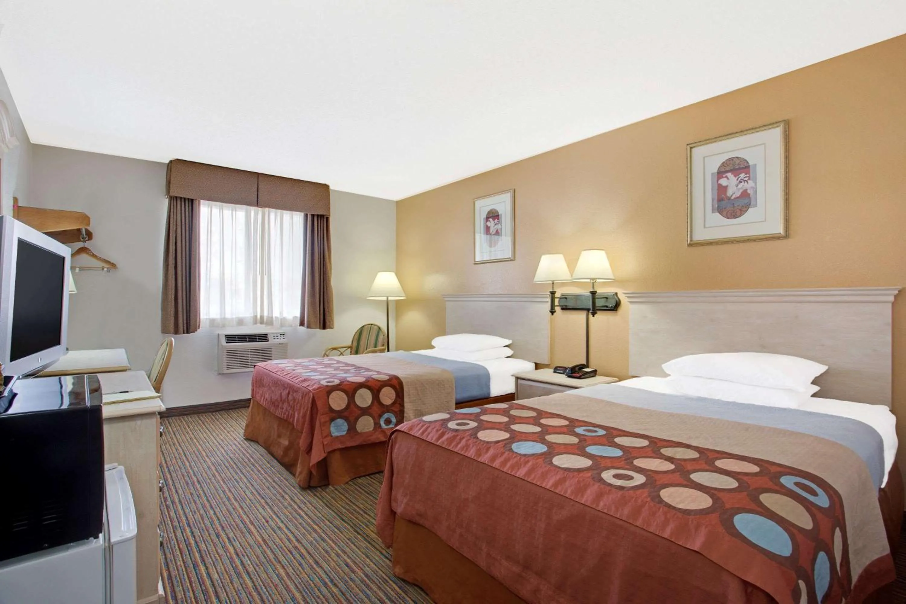 Photo of the whole room, Bed in Super8 by Wyndham NEARBY Clearwater St Petersburg International Airport