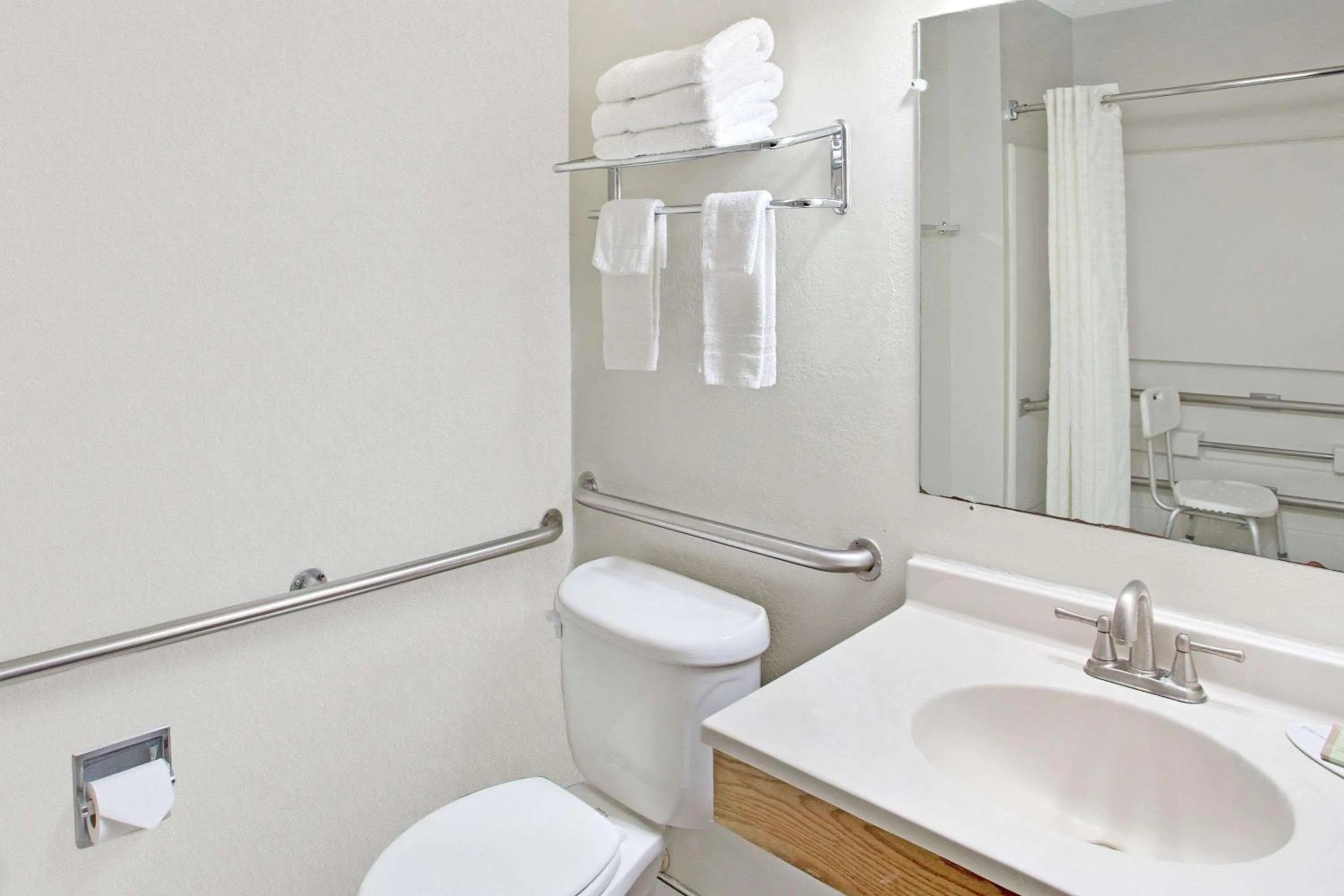 Toilet in Super8 by Wyndham NEARBY Clearwater St Petersburg International Airport