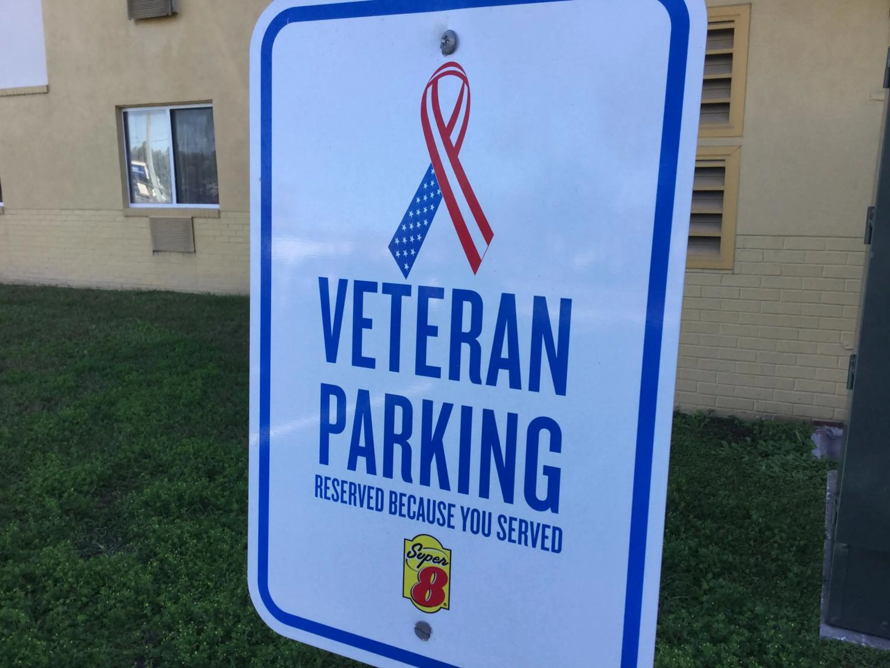 Property logo or sign in Super8 by Wyndham NEARBY Clearwater St Petersburg International Airport