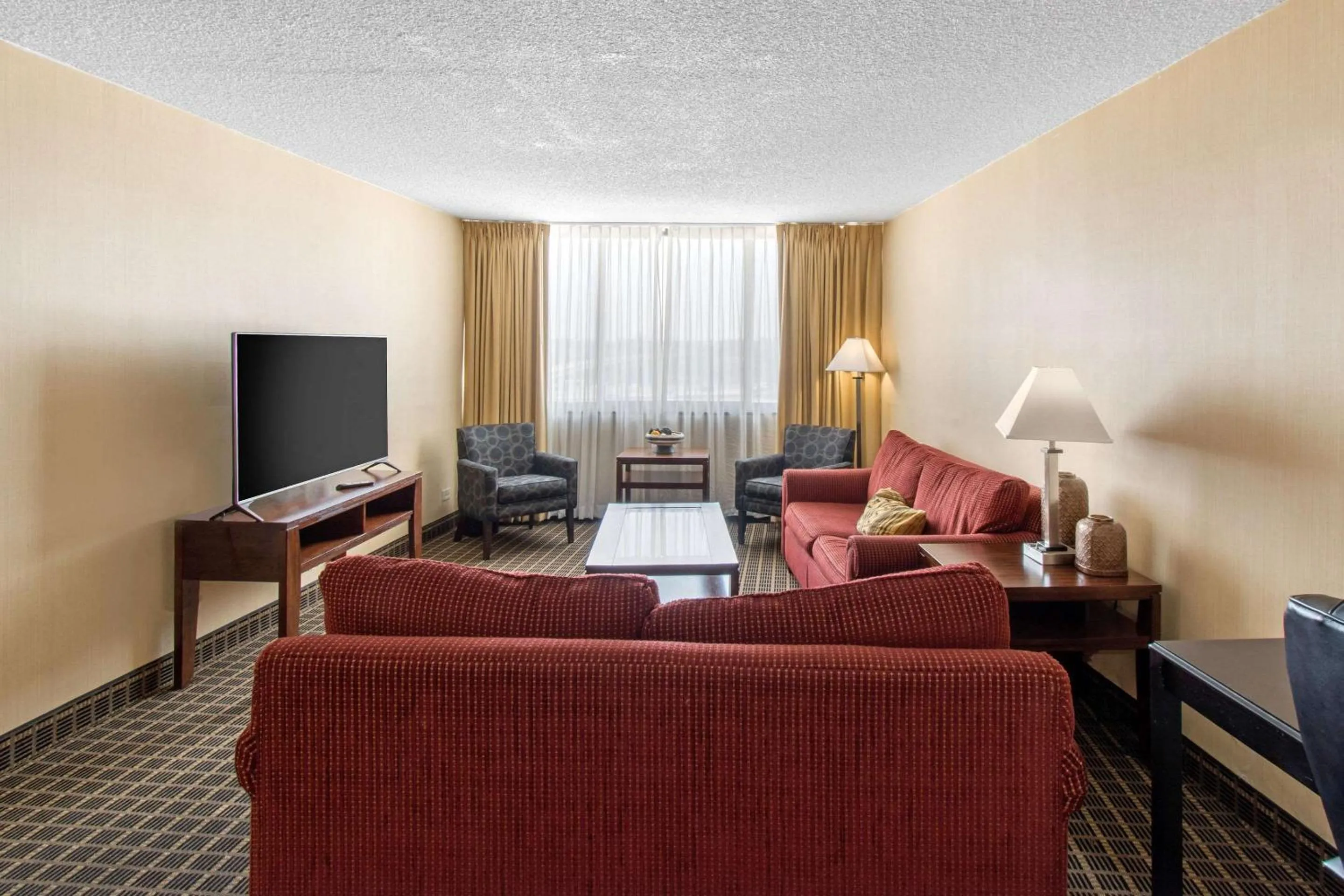 Photo of the whole room, Seating Area in Clarion Hotel Denver Central