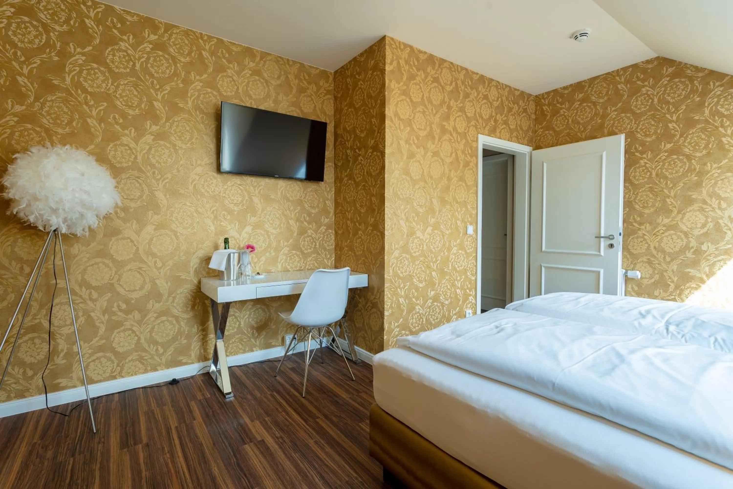 Bed in MOMENTS Boutique Hotel